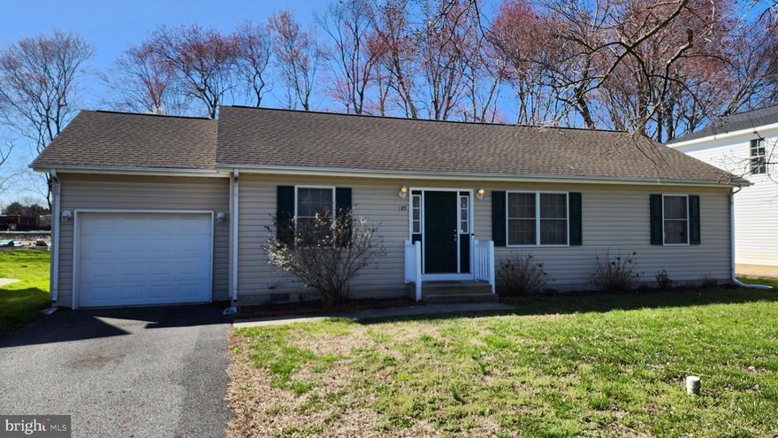 Welcome to 125 East St! This home has curb appeal with a front garden area, custom door and matching shutters. This open floor plan ranch home has beautiful hardwood floors. The primary suite is to the left with a large walk in closet and attached full bath. The kitchen and dining area is spacious for entertaining. Opposite of the dining is a laundry room, utility closet, and entrance to the attached garage. The home also boasts 2 additional spacious bedrooms and full hallway bathroom. The fully fenced backyard extends the living space with a new patio and pops of flower gardens that have been immaculately maintained! Less than an hour drive to the beaches, it's also very close to Routes 1 & 13 for easy commuting. Make your appointment and see all that this home has to offer!
Please note, the address for this home is as listed, but comes up as "125 Rd 350" on Google Maps.