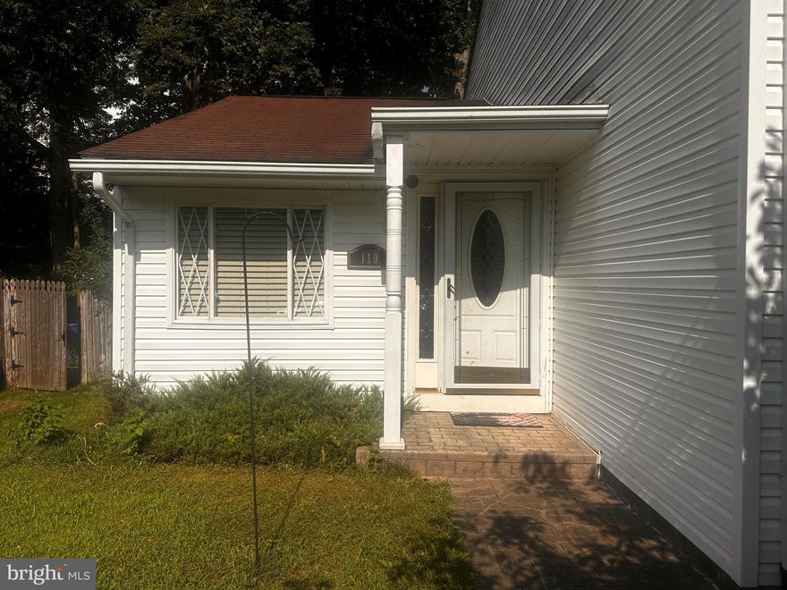 Rarely available split-level semi-detached home in sought-after Willoughby Woods! This spacious 4-bedroom, 1 full and 2 half bath home offers a flexible layout with generous finished living space. Step under the charming covered front porch and through the oval leaded glass front door into a welcoming foyer that flows into a bright and open living and dining room “L”—perfect for entertaining. The galley-style kitchen features a cozy breakfast area, ideal for enjoying your morning coffee. A short staircase from the foyer leads to the upper level with three well-sized bedrooms, a beautifully remodeled full hall bath, and a private half bath in the primary bedroom with shared access to the full bath. The lower level offers a versatile family or rec room with natural light from front-facing windows, a fourth bedroom, a half bath, and a convenient laundry/utility room. The fully fenced backyard is a true highlight, featuring a spacious stamped concrete patio and two storage sheds. Additional amenities include a stamped concrete sidewalk, a two-car driveway, and off-street parking. This is an estate sale being sold strictly AS-IS by the personal representative. A fantastic price reflects the need for updates—don’t miss the opportunity to make this home your own!