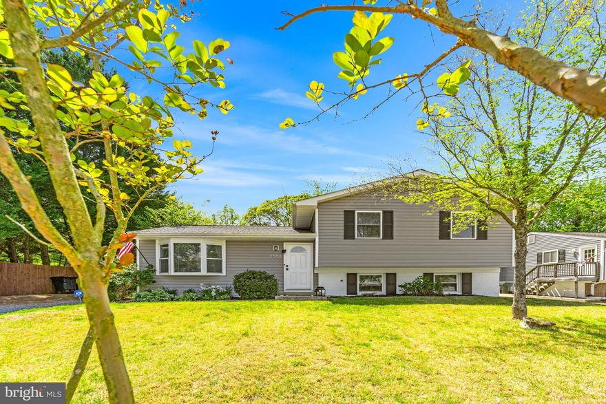 Step into style and comfort with this thoughtfully updated 3-bedroom, 3-bathroom home, where modern finishes meet inviting spaces. From the moment you walk in, you’ll notice the warm natural light pouring into the den—an ideal spot to unwind, read, or entertain guests. The heart of the home is the updated kitchen, featuring sleek granite countertops, stainless steel appliances, and a cozy breakfast nook framed by a picturesque bay window. Whether you're whipping up a quick breakfast or hosting weekend brunch, this space delivers. Downstairs, the versatile recreation room offers plenty of space to spread out—complete with a charming brick fireplace and a newly added full bathroom, it’s perfect for movie nights, game days, or guest accommodations. Situated on over half an acre, the expansive lot gives you all the space you need to enjoy the outdoors—think summer barbecues, or a fire pit. And with the water, shopping, dining, and entertainment just minutes away, you’re never far from the action. Homes in Riva Farms don’t last long—schedule your showing today and discover the perfect blend of modern living and timeless charm!