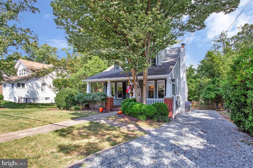 Beautiful bungalow with high ceilings and BIG windows that fill this home with natural light!  Situated on a gracious  15000 sq ft  level lot in lovely Berwyn.  Welcoming covered front porch and a spacious back patio - just waiting for you to grill out and entertain!  
The full-width living room has seven windows and gleaming heart-pine floors and a classic open staircase. Step up into the dining room with its natural oak flooring, useful corner closet and a chandelier.  The updated kitchen has new quartz counters, subway-tile back splash and brand new SS appliances including the 5-burner gas stove with a center griddle, a dishwasher & fridge!  The kitchen has a super useful breakfast counter, lovely vaulted ceilings and is open to the sunroom addition.  What a  gorgeous view and access to your new backyard.  Fabulous fenced yard - there's plenty of room to plant and play!
The main level includes a family room open to the vaulted-ceilinged sunroom with 10 windows. The family room has built -ins and could return to being a bedroom if needed.  Don't miss the spacious hall closet and the full bath with a tub/shower and pedestal sink. 
Upstairs the heart-pine flooring continues. The primary bedroom peacefully overlooks the backyard and has a large walk-in closet.  I love the nook area plus there is under eave storage in all three bedrooms.  The front bedroom enjoys 4 windows overlooking the tree-lined street and has built-in wall boxes and a good sized closet. The 3rd bedroom is on the driveway side and has a surprisingly deep closet too. The big beautiful bathroom has dual sinks, a tub/shower and a charming and useful Dutch Door!
The full, unfinished basement is neat and clean and holds utilities, a laundry area and plenty of space for storage/workshop/gym/crafts.  It has direct access to the backyard as well.  Driveway parking includes an EV charger!  What a great spot, close to a playground, tennis courts and the bike path!  Situated in Berwyn near Lidl grocery store, shops and restaurants and so close to the University of Maryland's flagship campus!  If you work in the City of College Park there is potential closing cost assistance via the City-University Partnership Live + Work program!      You will love living here!