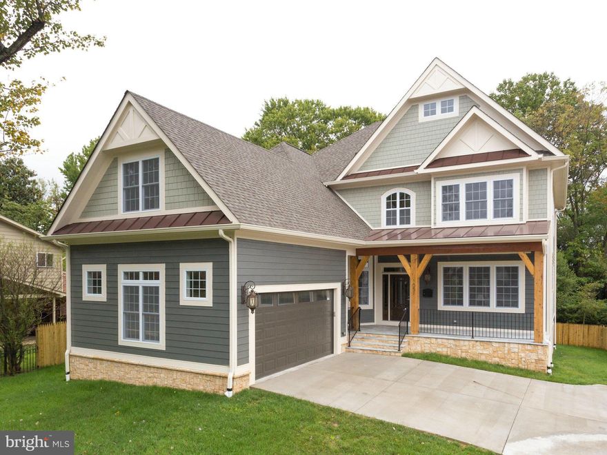 New, elegant brick and iron fence with automatic gate on this luxury home. This 6,411sq.ft craftsman is situated on .25 acre and offers a spacious, yet cozy, family room with cedar coffered ceiling+stone fireplace. Also included are built ins, gorgeous floor to ceiling bay windows, deck off family room and functional mudroom. Basement is walk out and includes pre-wired theatre, wet bar, fireplace.