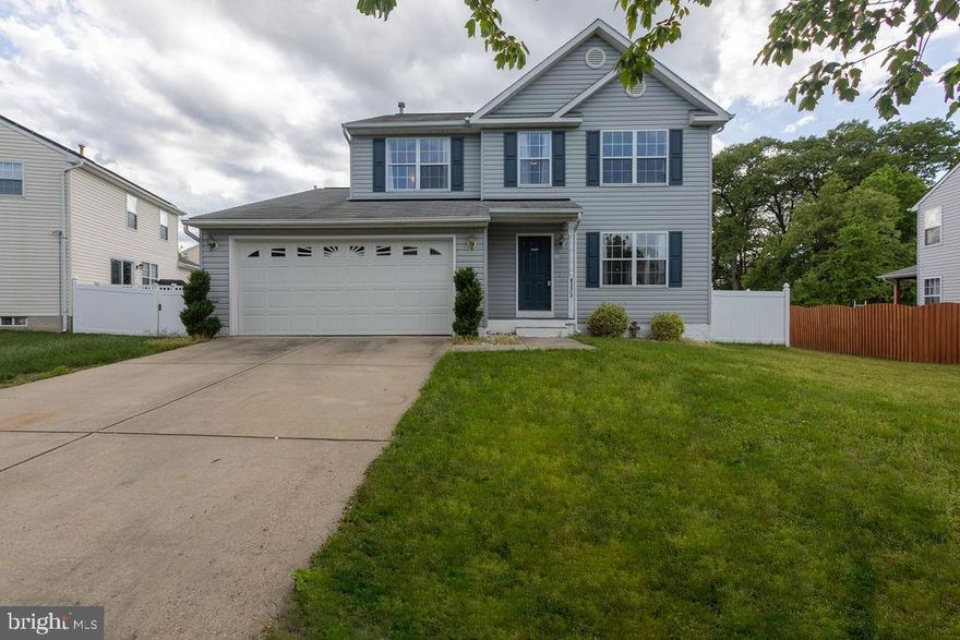 This colonial style home is loaded with potential.  Move in ready but plenty of room to make it your own. Large Master Suite with walk in closet and on suite master bathroom.  Beautiful hardwood floors throughout the main level.  The back yard is huge with a deck for entertaining.  The basement is finished with a large family room.  Property is being sold as-is.