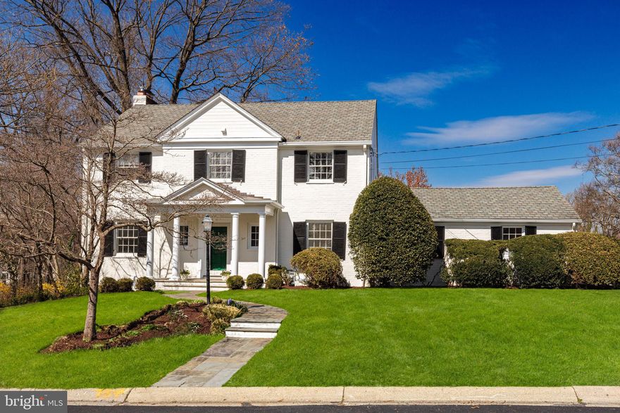 Welcome to 8026 Glendale Road! A sophisticated property in The Hamlet with all the bells and whistles!  Thoughtfully renovated and meticulously maintained colonial offering six bedrooms including a main level primary bedroom suite as well as five additional bedrooms on the second and third levels.  A kitchen/family room that everyone desires - with vaulted ceilings and plenty of counter and eating space.  Main level laundry and mudroom off the kitchen leading to the two-car garage and circular driveway.  Main level office as well as a large living, dining room and welcoming foyer.  The deck connects the living room and family room for gracious entertaining.   Freshly painted with decorator colors inside and out.  All five baths have been recently renovated.  Estimated 4,600  livable square feet set on a 12,914 square foot corner lot.