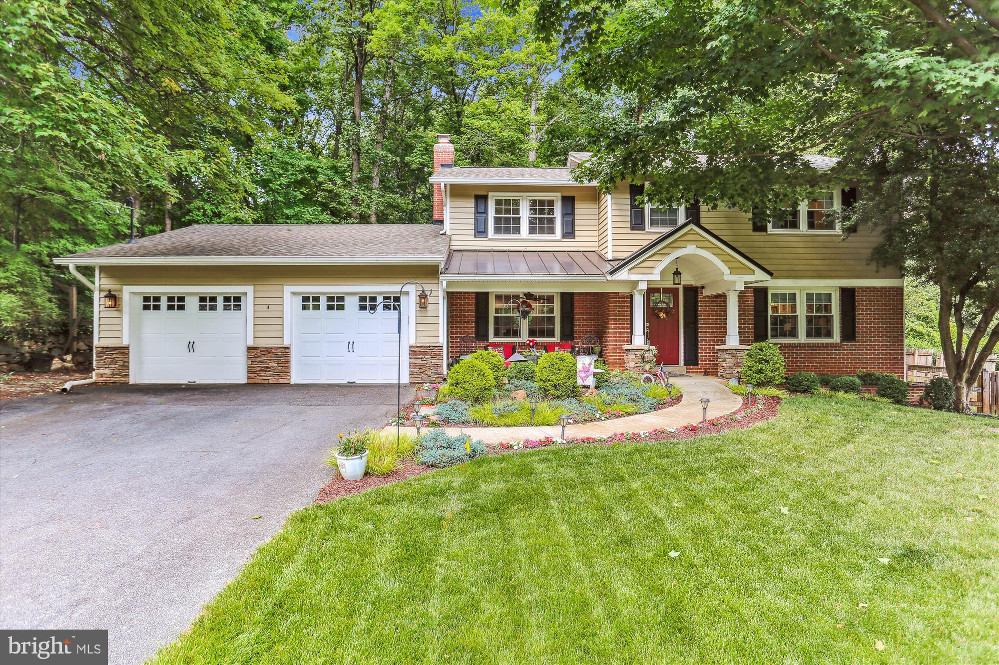 Welcome to your dream home! This remodeled colonial is a true gem that stands out from the rest. The oversized two-car garage and relaxing front porch are just the beginning of the incredible features this home has to offer. Around ten years ago, a large addition was thoughtfully incorporated into the home. On the main level you'll be greeted by a spacious and inviting kitchen (renovation in 2021) that will make any chef's heart skip a beat. The exquisitely remodeled kitchen flows effortlessly into the spacious dining room, offering plenty of room to accommodate guests. The kitchen boasts quartz countertops, stainless steel appliances, and even a wine fridge. With an abundance of counter space and a large island with seating, meal preparation and entertaining will be a breeze. The open concept floor plan also seamlessly connects the kitchen to the family room with gas fireplace, creating a warm and inviting atmosphere. When you're in the mood to relax and enjoy the fresh air, you have various options! The gorgeous front porch addition invites you to unwind and soak in the tranquility of the neighborhood. Alternatively, the serene back patio provides a private retreat where you can unwind and enjoy the beautiful natural surroundings. The backyard also features a large grassy area, perfect for outdoor activities. Returning inside the property, you'll discover that the basement is partially finished and provides additional living space. A bright walk-up family room/recreation room awaits you, complete with a fabulous wet bar. There's even a full bath conveniently located in the basement. Additionally, ample storage space ensures that all your belongings are neatly organized and easily accessible. Heading to the upper level, you'll find four well-appointed bedrooms and two full baths. The master bathroom has been tastefully updated and features the luxurious addition of heated flooring, providing a spa-like experience right at home. This home has an electric heavy up, high efficiency HVAC system, ample recessed lighting and a sound system. Conveniently located with easy access to the ICC and I-270, commuting is a breeze. The Shady Grove Metro station is just minutes away, offering effortless access to the city and beyond. This sought-after location combines the tranquility of a peaceful neighborhood with the convenience of nearby amenities. Schedule a showing today and experience the perfect blend of comfort, style, and convenience that awaits you.