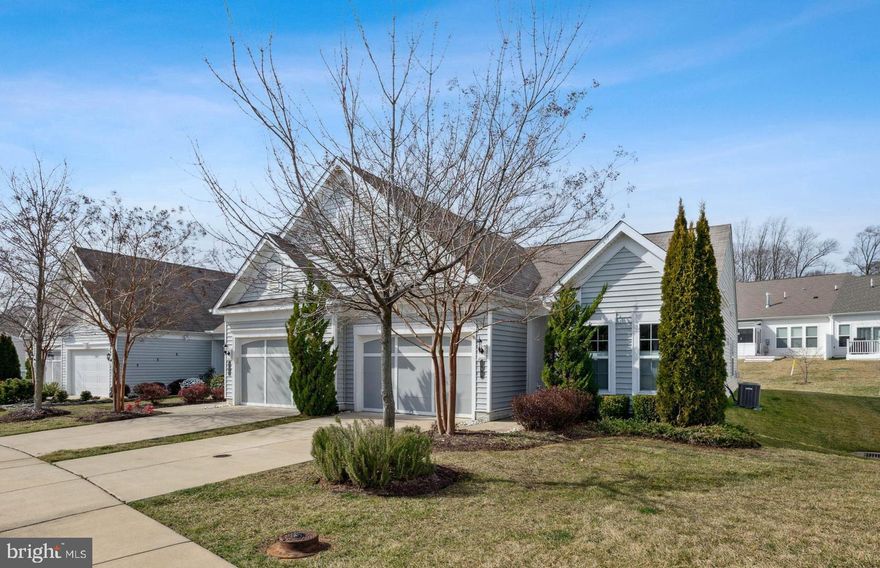 All dressed up and waiting for a new owner.  Freshly painted,  new Luxury Vinyl Plank flooring throughout.  Ceramic tile in both baths.   Bright sunny Villa with fireplace,  flex room and oversized garage.  Enjoy the comforts and amenities of Celebrate.  Over 30,000 sq. ft. Community Center and so many activities you can be busy as you want to be or just relax on your deck and enjoy your neighbors.  Enjoy a bea
