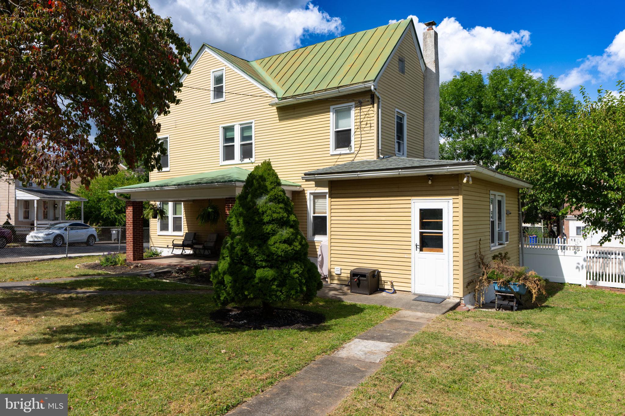 Absolutely gorgeous 2,000 sq ft single home on large, open lot! Remodeled throughout including upgraded, vinyl windows and gas heating system. Tastefully done kitchen and bathrooms. All appliances remain. Off street parking for 2 cars as well as a fenced-in yard. Covered front porch entrance with attractive wood ceiling only adds to the character and charm of this well-maintained home. Fully finished 3rd floor bedroom is very open and spacious. Nothing to do but move in and enjoy single family home living!