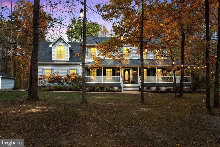 Welcome to 4565 Gavin Woods Court, an exceptional country estate gracefully situated on over two pristine, wooded acres in the heart of Catlett, Virginia—where refined living meets serene privacy.

Showcasing over $122,000 in curated upgrades, this stately three-level Colonial exudes timeless elegance and thoughtful design. A grand wrap-around porch sets a commanding first impression, while the expansive entertaining deck creates a seamless connection to the surrounding natural beauty. Rarely offered, the property features both an attached two-car garage and an additional one-car garage, providing exceptional versatility for collectors, hobbies, or extended storage.

Inside, more than 3,800 square feet of beautifully appointed living space unfolds across five bedrooms and four-and-a-half baths. Rich hardwood floors, a sophisticated fireplace, and an updated chef-inspired kitchen anchor the home’s elegant interior—designed for both intimate daily living and elevated entertaining. The luxurious primary suite offers a private sanctuary, complete with generous proportions and spa-like comfort.

Surrounded by mature trees and tranquil woodland views, this residence delivers a rare sense of seclusion and grandeur. Enjoy the freedom of NO HOA, expansive outdoor living, and the unmistakable charm of true country estate living—perfectly balanced with convenient access to nearby amenities and commuter routes.

Significant Recent Enhancements:
• New Roof (2025)
• HVAC System (2023)

An extraordinary offering that blends sophistication, privacy, and enduring craftsmanship—this is luxury country living at its finest.