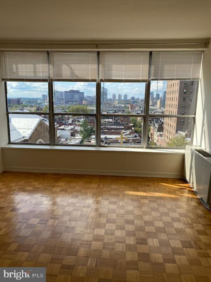 NEW PHOTOS COMING SOON! Updated studio with floor-to-ceiling windows located at The Dorchester on Rittenhouse Square! This efficiency features a sun-drenched living area boasting an entire wall of bay windows; parquet wood floors throughout; an updated kitchen with white cabinets and stainless steel appliances; and a full, hall bathroom with a single vanity, tub shower, and grey marble floor. Residents of The Dorchester enjoy a twenty-four-hour doorman and all utilities included in rent except cable TV. Use of the building's state-of-the-art fitness center, seasonal rooftop pool club, and valet parking in the building's underground garage are available for an additional fee, subject to availability. No pets permitted. Rittenhouse Square is ranked the 6th best neighborhood in North America with 175 restaurants and 199 retailers within a three block radius. The Dorchester is within walking distance to the Market Street office corridor, The Avenue of the Arts and University City. 30th Street Station and Philadelphia International Airport are a short commute.