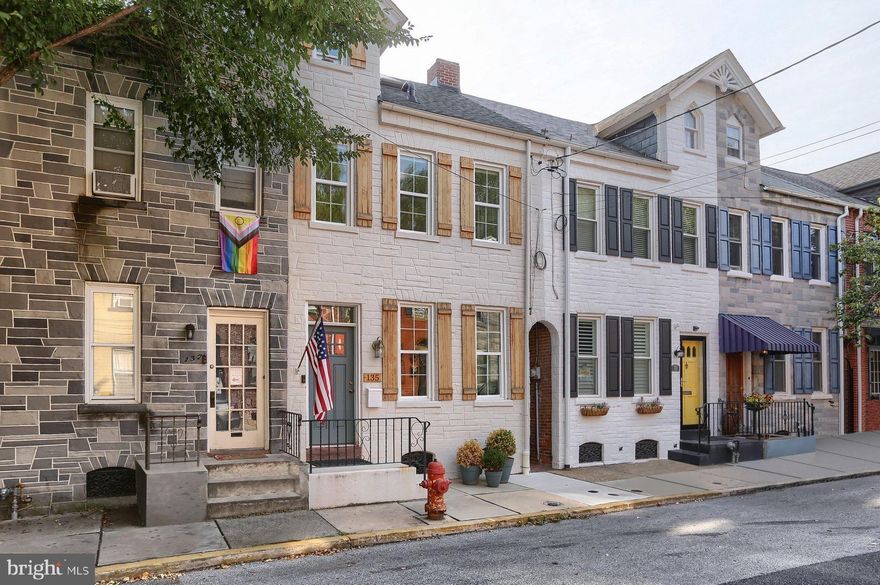 Absolutely stunning home in the Nevin Community that has recently undergone extensive renovation with Brentwood reconstruction.

The level of detail is impressive from the sandy wood flooring throughout to the high ceilings and ample natural light. The home offers a cozy and inviting atmosphere.

The morning light streams through the primary suite and kitchen windows creating a serene and refreshing start to the day. The combination of cozy lighting and the well-designed layout contributes to a warm and comfortable environment.

The kitchen is a standout feature with its modern amenities, including stainless steel appliances and a gas stove. The blue cabinetry with gold hardware, range hood, and sandy Rattan cabinets adds a stylish touch. The attention to detail in the kitchen design makes it a central and appealing space.

The layout of the bedrooms and bathrooms are quite functional. The arrangement of the second-floor full bath, open office, 2 bedrooms, along with the laundry facilities, shows the well-thought-out design that caters to convenience and makes working at home a breeze.

The third floor hosts the primary suite with an ensuite bathroom, walk-in closet, and wall-to-wall windows offering a luxurious and peaceful retreat. A huge bonus to the primary suite is the double doors leading to the third-floor balcony with incredible views of sunsets and sunrises.

Outdoor amenities enhance the property's appeal. The patio, pergola covered with vines giving the comfort of shade, fenced-in backyard, and fire pit create a space that's ideal for relaxation and entertainment. The backdrop of birds chirping in the morning further adds to the tranquil setting.

The prime location allows walking distance to bars, restaurants, cafes, downtown Lancaster, and recreational spots like the Barnstormers stadium and Buchanan Park make it convenient for entertainment and leisure activities.

The inclusion of smart home features like Alexa integration, and off-street parking for two cars further add to the property's modern conveniences.

Don’t forget to ask us about the assumable loan option with a favorable rate of 2.375%.

With the perfect balance of comfort, style, and convenience, this home will not last long! What are you waiting for? Schedule your showing TODAY!