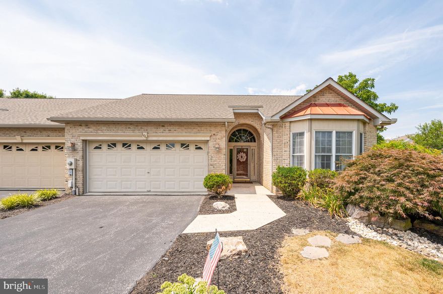 You will fall in love with this BEAUTIFUL 2 bedroom 2 bath villa in the heart of the Spring Mills Community.  This home boasts curb appeal with a full brick exterior,  BRAND NEW architectural shingles, copper standing seam roof over the bay window, and landscaping all located at the end of the cul-de-sac.  This home invites you in with a front door alcove and custom painted exterior doors.  The inside features high vaulted ceilings,  hardwood floors,  upgraded light fixtures and ceiling fans, gas fireplace with a granite hearth, separate dining area and a pocket door. The kitchen features granite countertops, ceramic tile floor, pantry, and double bowl sink. Next, the primary suite has a walk in closet and primary bath featuring ceramic tile flooring, shower wall floor to ceiling tile with listello feature, soap niche, seat and framed shower glass door.  The large sunroom and deck are perfect for entertaining or relaxing at the end of your day. This subdivision offers a large in-ground community pool, tennis courts, walking trails and a playground. Conveniently located minutes from I81, shopping, restaurants, and medical services.  Welcome to your home sweet home!