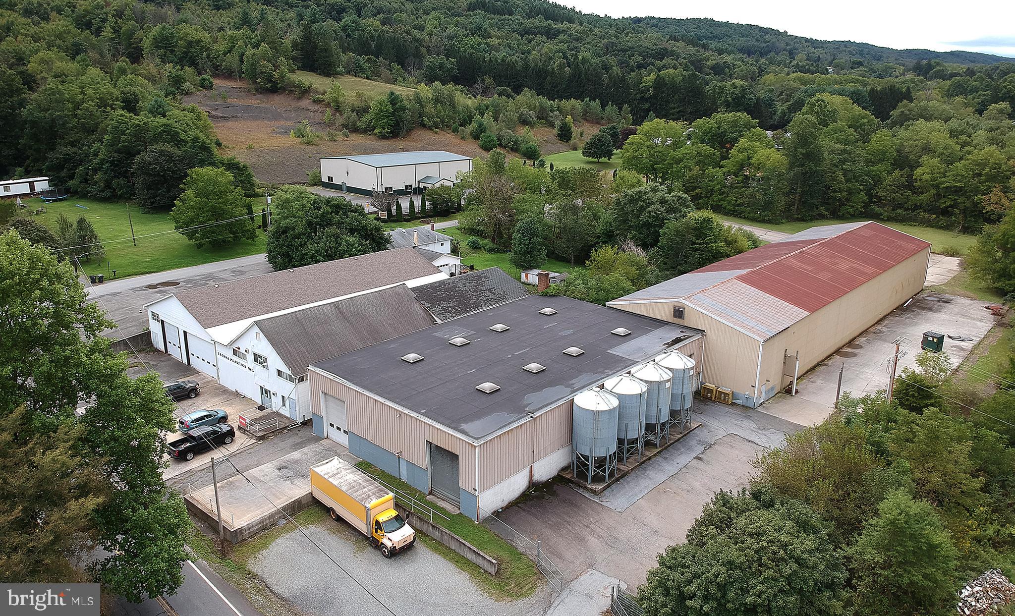 Industrial property with heavy electric, two 10 ton overhead cranes, loading docks, overhead bay doors, office and storage space. Located on over 9 acres just a few miles from Lehighton PA. Approximately 5 acres of additional land for future development and distribution.