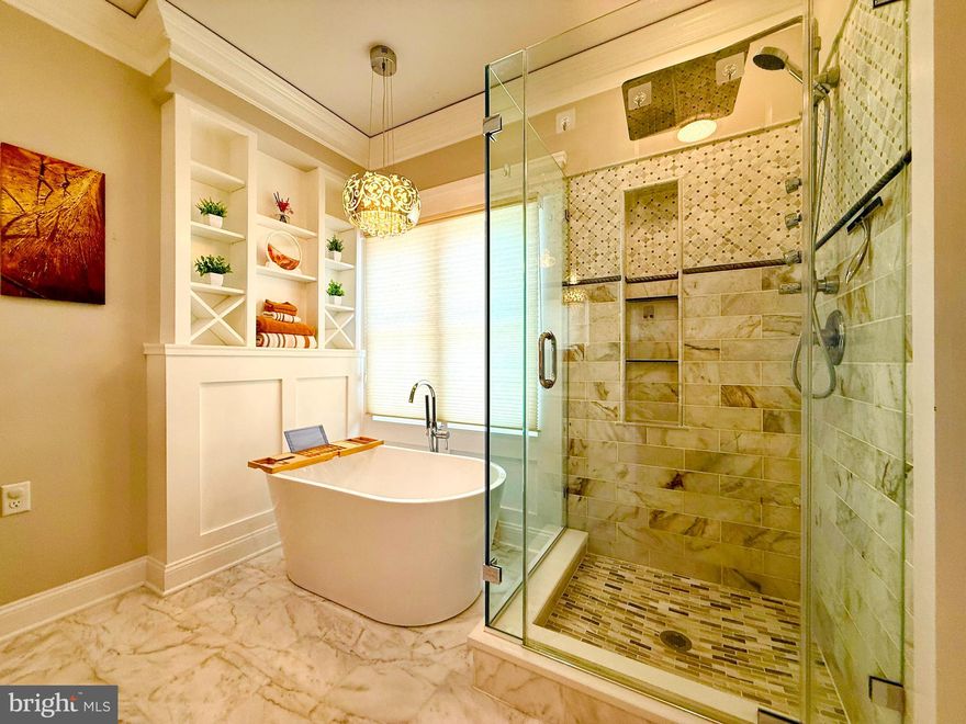 MOTIVATED SELLER RELOCATING FOR A JOB

Welcome to 2462 Five Shillings Rd in picturesque Wormans Mill. This 3 bedroom 2.5
bath home has 2900 finished sq feet of living space, plenty of room to rest, relax and
entertain. The main level features a large living room with fireplace, dining room, half
bathroom, large upgraded kitchen and the first floor owner's suite with a spa-like full
bathroom and walk-in closet. The sunroom off the kitchen is large and inviting with lots
of natural light. Outside, the composite deck overlooks the patio and beautiful English
garden. A detached oversized garage provides room for 2 vehicles and storage. The
upper level features two large bedrooms and has another full bathroom. The lower level
features a second family room area with a gas fireplace, a flex space with built-in wall
fish tank, a bonus room with a barn door that can be used as an office/possible 4th
bedroom/ home gym. Rounding out the basement is a storage room with ample space.
New water heater, washer and dryer. Stunning hard wood floors throughout that is a
must see. The house and garage boast a quality new roof. The neighborhood has many
amenities such as a pool, walking trail throughout, restaurants within walking distance,
shops and tot lots. Close to major commuter routes, shopping, dining and downtown
Frederick. Don't miss your chance to see this wonderful home.