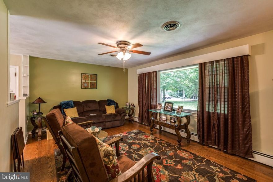 CHECK THIS ONE OUT!!! 4 LEVELS FOR YOUR FAMILY TO ENJOY!! WONDERFUL SETTING W/HUGE YARD IN FRONT&REAR!!GREAT FOR COMMUTERS!!LIBRARY&PARK TO WALK TO!!CLOSE TO MARINA OR THE BIKE TRAIL!!5 BR'S OR USE AS AN OFFICE!! GLEAMING HARDWOOD FLOORING, NEW CARPETING, FRESHLY PAINTED& MANY ITEMS UPDATED!!YOUR FAMILY WILL LOVE THIS HOME!! ONE YEAR WARRANTY!THIS ONE HAS IT ALL!!2 LOTS CONVEY FOR ALMOST 2 ACRES!