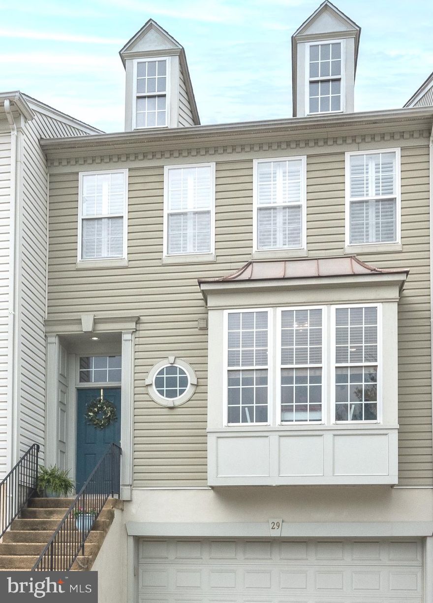 Welcome to 29 Almond Court, a stunning move-in ready 3-story 3 bedroom 2 full & 2 half bath townhome in Lafayette Hill within award-winning Colonial School District. The traditional facade with box window and dormers resembles a sophisticated city-style townhome. Enter the gracious foyer leading to a chef’s delight black and white kitchen with stainless steel appliances, gas oven, black counters, hanging pot rack, abundant counters and charming bar and breakfast room. Adjacent is a lovely powder room. 

The foyer continues to the sunlit open-concept dining room/living room with 9 foot ceilings, wainscoting, crown molding, gas fireplace with handsome mantel, three large windows and slider to azek deck. The deck has abundant views of open space and greenery with no homes in the backyard or across the street. Roof (2020), HVAC & Condenser (2022) and Hot Water Heater (2024) are just to name a few of the recent home upgrades. 

Turned staircase off the Living Room/Dining Room leads to the upstairs level with sophisticated master suite plus two spacious secondary bedrooms (either with excellent home office potential) and full hall neutral bath with doorway angled toward both bedrooms.  French doors off the hallway lead to a gracious master bedroom with tray ceiling and three large windows providing excellent natural light. Large sunlit master bathroom is within the master suite area and includes a large double stink, stall shower, and soaking tub. Easily accessible master closet is located just beyond the master bathroom. Washer and dryer are conveniently located within the hallway on the second floor. 

Separate staircase off the first floor foyer leads to a large lower level family room and two-car garage. The family room is spacious and versatile (potential use as a family room, home office or playroom) with a convenient powder room and slider to back covered sitting area providing additional serene sitting area for beautiful evenings. Easy inside access to two car garage with epoxy floor (2020) also filled with abundant wall shelving and closet storage is on this lower level. Additional parking on the driveway for two cars.

You will find this move-in ready stunning home in a very accessible location for travel to the city for work, restaurants and entertainment but also with all of the serenity and conveniences of living outside the city including open space views, nearby parks (including community’s new playground 2024), shopping, and restaurants all within the esteemed Colonial School District.  Proximity to Spring Mill Station regional rail line, the Blue Route and the Turnpike as well as Conshohocken and Plymouth Meeting restaurants, shopping and entertainment. This beautiful home is one you will love to call “Home”.