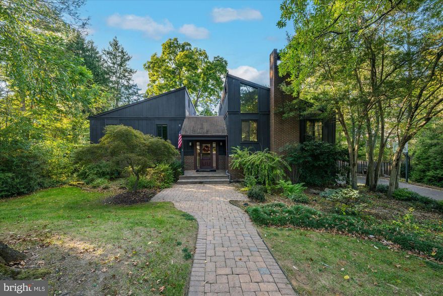 Welcome to this rarely available contemporary home in the sought after Balmacara neighborhood of McLean. Located on a quiet cul-de-sac, this home features 5 bedrooms and 4 full bathrooms on a .45 acre lot with an in-ground swimming pool. The main level features cathedral ceilings with exposed wood beams, hardwood floors throughout, an expansive primary suite with a sitting room with wood burning fireplace and a generous walk-in closet, and a wrap-around deck overlooking the fully-fenced back yard. The walk-out lower level includes a rec room with wood burning fireplace, 3 bedrooms, 2 full bathrooms, a game room, laundry room, and two-car garage. Convenient to downtown McLean, Tysons, and much more.