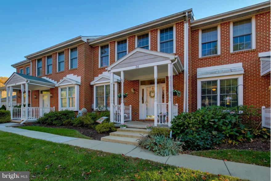 Luxury Townhouse w/2 Car Garage in the Community of "Ashland"*  Sunny Kitchen has Granite Counters & Hardwood Floors* Adjacent Breakfast Room w/Built-ins*  Spacious Living Room & Dining Room w/9 Ft Ceilings, Gas Fireplace & Sliders to Deck* Lower Level w/Family Room, Full Bath & Walkout to Patio* Deck & Patio Overlook Wooded Private Setting* Walk to the NCR Trail* Conv to Hunt Valley & I-83