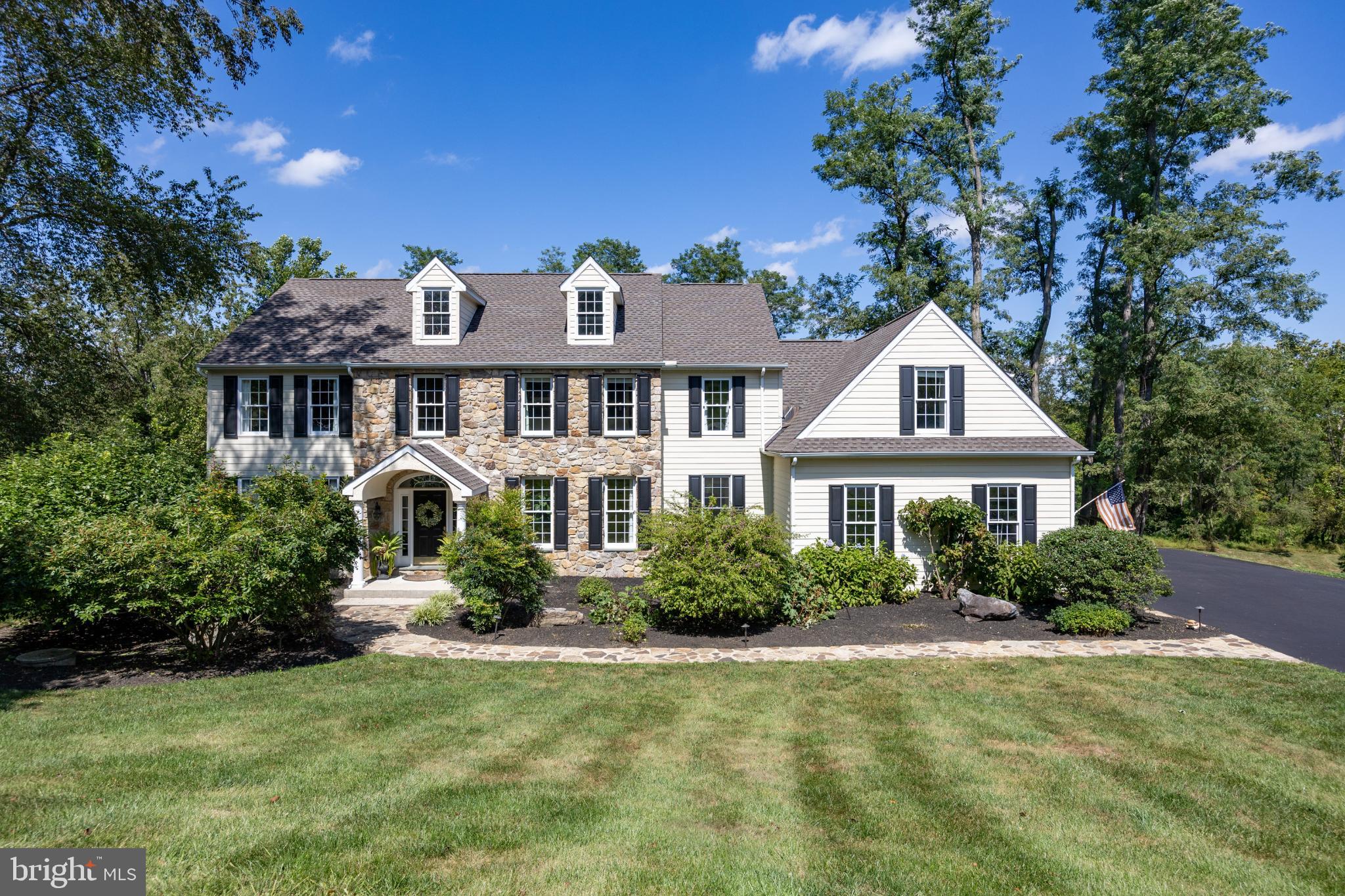 Nestled on a serene 1.22-acre lot in the highly sought-after Unionville-Chadds Ford School District, this exceptional 4-bedroom home with a bonus room and 3 full baths offers over 5000 sq. ft. of exquisitely designed living space. The first floor showcases a thoughtful layout with both style and function, including a stunning kitchen with refinished cabinets, stainless steel appliances, and an open floor plan that flows seamlessly into the family room with a cozy gas-burning fireplace. Two sets of stairs enhance accessibility, including a convenient back staircase off the kitchen. The living room features a second gas-burning fireplace, perfect for entertaining or relaxing, while the dining room is adorned with elegant grass cloth wallpaper, creating a sophisticated space for gatherings. Completing the first floor are a well-appointed office with built-ins and grass cloth wallpaper, a mudroom with built-in storage, and a convenient laundry room, combining everyday practicality with luxury finishes
Upstairs, the primary suite is a private retreat, featuring a remodeled spa-like bath with heated floors (2024) and a custom walk-in closet that is both a fashionista’s dream and a model of organization.The second floor also includes three additional sizable bedrooms and closets a newly updated hall bath (2024), and a bonus room with its own full bathroom, providing flexible space for guests, media, or play. The finished walkout basement, newly carpeted in 2024, offers versatile space for a media room, gym, or playroom.
This home has been thoughtfully updated with premium features, including a new roof (2024), dual HVAC units (2020), water heater (2019), and new garage doors with electric openers (2022), providing peace of mind alongside modern luxury. Outside, the expansive deck and lot offers ample space for outdoor activities or serene relaxation.
Ideally located, this exceptional property is close to both the vibrant West Chester and Kennett Square boroughs, with convenient access to all major routes, combining timeless updates, luxurious finishes, abundant space, and a prime location for an elevated lifestyle.