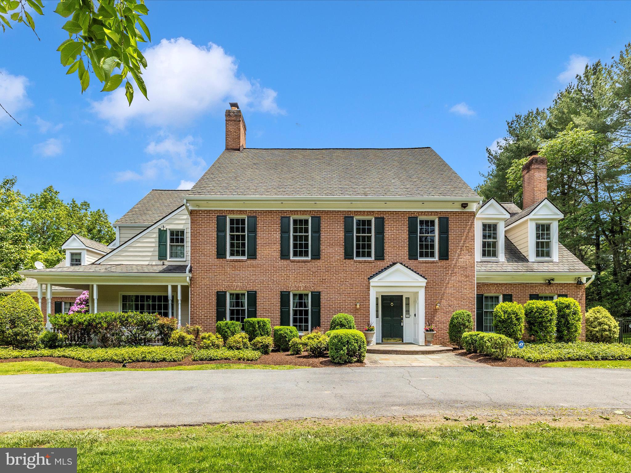 So much square footage for the price! Nestled on a serene 2-acre lot in Potomac, Maryland, this 8487 square-foot elegant brick colonial embraces you with the tranquility of protected parkland on two sides. Just a short drive to Potomac Village, its prime location offers the perfect balance of privacy and connectivity.
A Grand Entrance and Inspiring Interiors leads to the formal living room featuring a stately fireplace and double French doors that open to a light-filled sunroom with floor to ceiling windows overlooking a lush, meticulously landscaped garden. Adjacent, the formal dining room basks in natural light from glass doors that lead to a flagstone patio—ideal for gatherings. Custom millwork throughout these rooms amplifies the luxurious ambiance, creating spaces that invite both relaxation and refined entertaining.
The Heart of the Home: The kitchen boasts ample counter space, a generous center island, and an adjacent breakfast room for casual meals. The first level also hosts a spacious family room with a brick fireplace, a stately office, and a bonus room with extra storage and convenient direct exterior access.
A Private Retreat Upstairs: Ascend to the second level, where five generously sized bedrooms await, complemented by a versatile laundry room that doubles as a kitchenette. The expansive primary suite impresses with high ceilings, two inviting seating areas, and an adjacent room that can easily transform into an exercise space, office, or additional storage—tailor it to your lifestyle. A walk-up, already framed attic offers exciting potential for extra bedrooms or living space.
Entertainment and Versatility in the Basement: For hosting friends or enjoying quiet evenings, the fully finished basement provides an entertainer’s dream: a pool table, wet bar, and a third fireplace set the stage for lively gatherings. An additional bonus room and a full bathroom provide ample space for guests or hobbies.
Extra Amenities and Outdoor Enjoyment: Parking is a breeze with both a two-car attached garage and a two-car detached garage—the latter topped with a finished area perfect for a separate office. Step outside into your private backyard retreat featuring a large flagstone patio, expansive grassy spaces, and a pool perfect for summer festivities.
Your Ideal Potomac Lifestyle Awaits: Situated just steps from top-rated schools, premier dining, vibrant shopping, and two acclaimed golf courses—with easy access to Washington, D.C.—this home presents an unmatched opportunity. Schedule your private tour today and begin the next chapter of your life in a home that truly defines elegance and comfort.