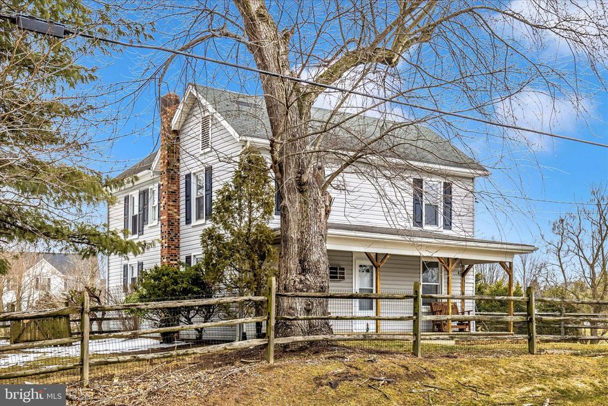 Country Living. 1925 Maryland farmhouse Large open kitchen, cozy family room with wood stove.  Another room that is multi purpose, bedroom, office, has attached full bath.  
Upstairs 3 bedrooms and laundry
Detached garage can house 4 cars, has water and heat. Plus extra storage
Yard is fenced 
relax on your front porch swing.
Close to major routes 81 and 70