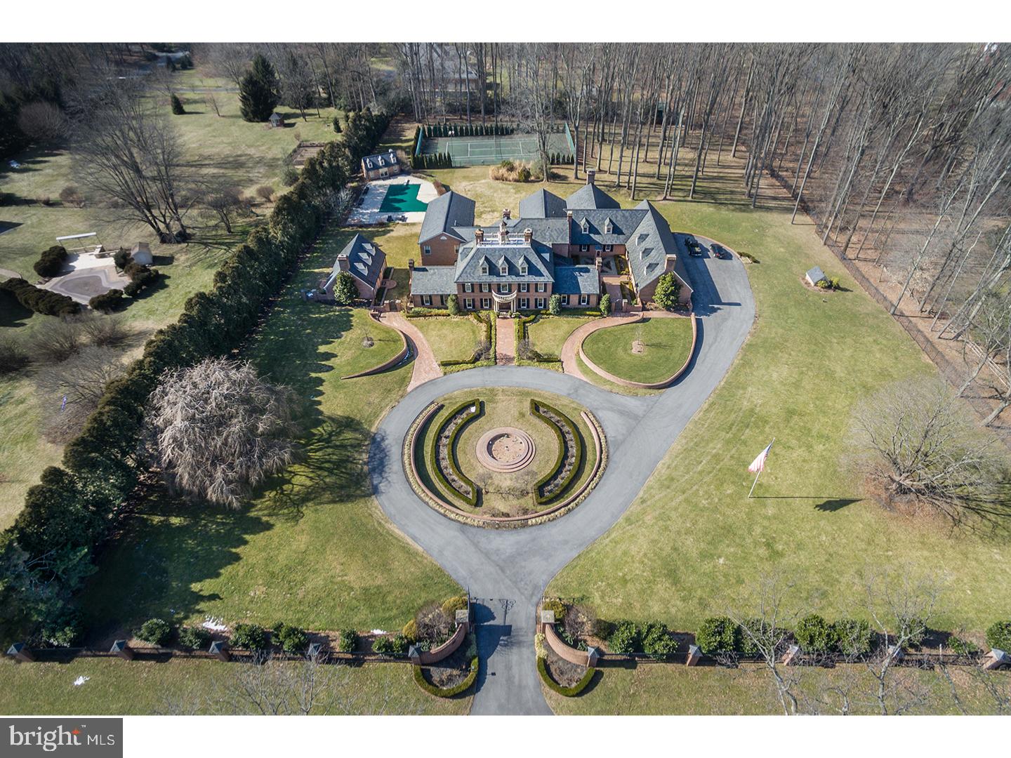 This majestic Willistown Estate offers the rarest combination of classic Architectural designs, premier construction, and breathtaking renovations and expansions, blended seamlessly throughout. It features only the finest materials, amenities, and craftsmanship within the interior as well as the extraordinary outbuildings and breathtaking grounds. Features include beautiful moldings and millwork, site finished wide plank floors, a premier Gourmet "La Cornue" Kitchen, spectacular 2-story Family Room with exposed stone walls, sun-filled entertaining and living spaces leading out to the glorious, private grounds, luxurious Master suite, 5 additional spacious Bedrooms, 3 with custom tiled en-suite baths and 2 with Jack and Jill bath, incredible finished Lower Level, charming 3 Bedroom guest house with full Kitchen and Bathroom, beautiful pool with pool house and more. Enjoy living and entertaining in gated vacation surroundings, while being only minutes from renowned schools, all forms of transportation, The King of Prussia Mall, Center City Philadelphia, The International Airport, and 2 hours from New York City. Absolute move in condition!