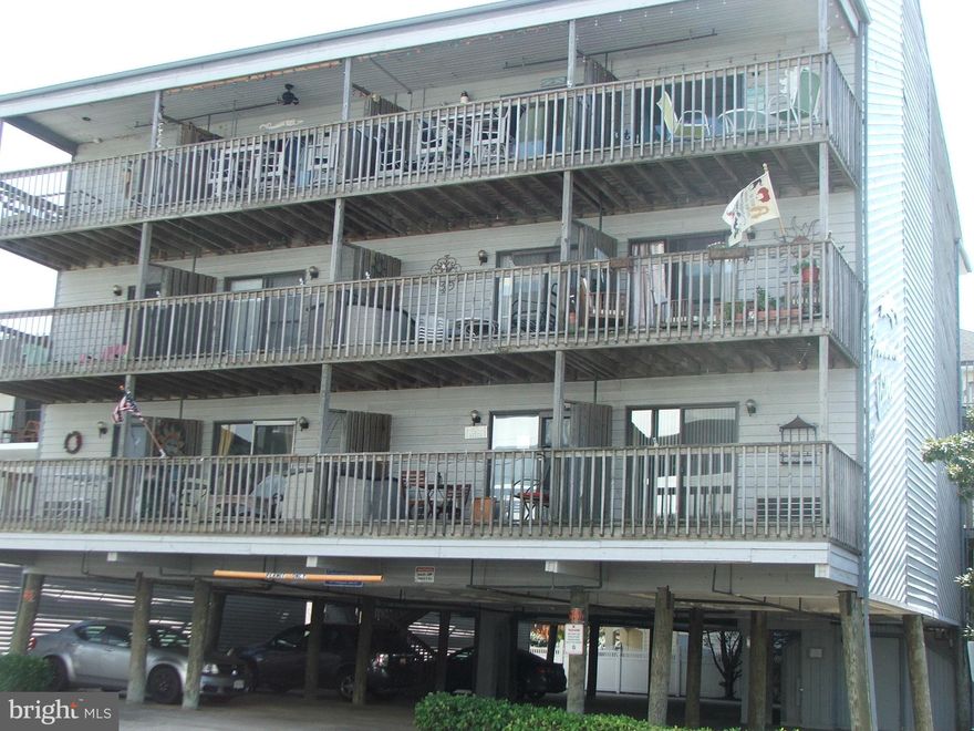 This cozy, freshly painted efficiency is LARGER than many one bedroom units and is ready for immediate occupancy. Washer/dryer located in unit. Centrally located mid-town, oceanside , this unit is close to the beach, grocery stores, restaurants, coffee shops and the busline (no need to drive).  Enjoy ocean views or people watching from the private balcony.  Under building parking for one vehicle, with plenty of nearby street parking.  Outside shower allows for rinsing the sand off chairs, bogey boards and sand toys ,which can then be stored in an individual, ground-level locker.  Use this unit for your own personal enjoyment, weekend getaways or for a short or long term rental.  Large, shared deck is great for watching fireworks, crab picking or sunbathing.  Low condo fees round out the reason to own "your place at the beach"!