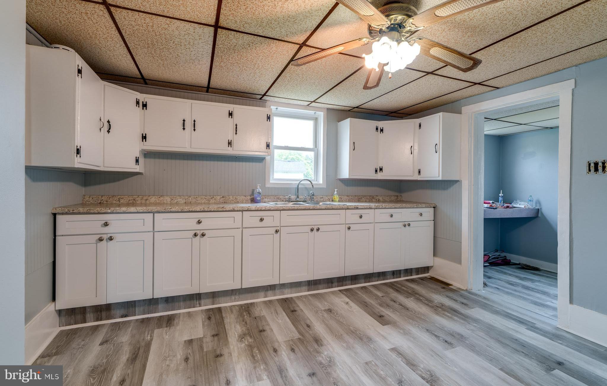 Newly renovated single family home! Move in ready or add to your rental portfolio! Here is your chance to own a home for less than rent! Featuring a new kitchen, fresh paint and new flooring throughout!