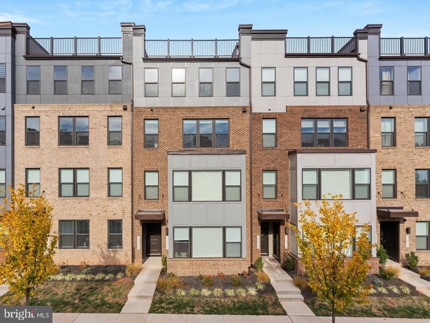 Welcome to 43812 Middleway Terrace, an exquisite Stanley Martin Tessa model offering over 2,500 sq. ft. of sophisticated comfort in Metro Walk at Ashburn Station. Built in 2024, this stunning upper-level condo townhome combines the sleek design of urban living with the warmth of a suburban retreat.

Step inside to discover 10-foot ceilings, wide-plank hardwood floors, and a bright open-concept layout perfect for entertaining or relaxing at home. The gourmet kitchen is a true centerpiece, featuring quartz countertops, stainless steel appliances, a massive center island, and a modern tile backsplash. The spacious family room opens to a private balcony, creating seamless indoor-outdoor flow.

Upstairs, unwind in the luxurious primary suite with a generous walk-in closet and spa-inspired bath boasting dual vanities and a frameless glass shower. Two additional bedrooms, a full bath, and upper-level laundry complete the space. Enjoy the convenience of a garage with driveway parking, all just minutes from the Silver Line Metro, Dulles Airport, and premier shopping and dining at One Loudoun and Brambleton Town Center. Extra street parking by the sales office to the left of the neighborhood. Follow sales office signs for more parking.

Experience modern elegance, unbeatable location, and effortless lifestyle, all in one place!