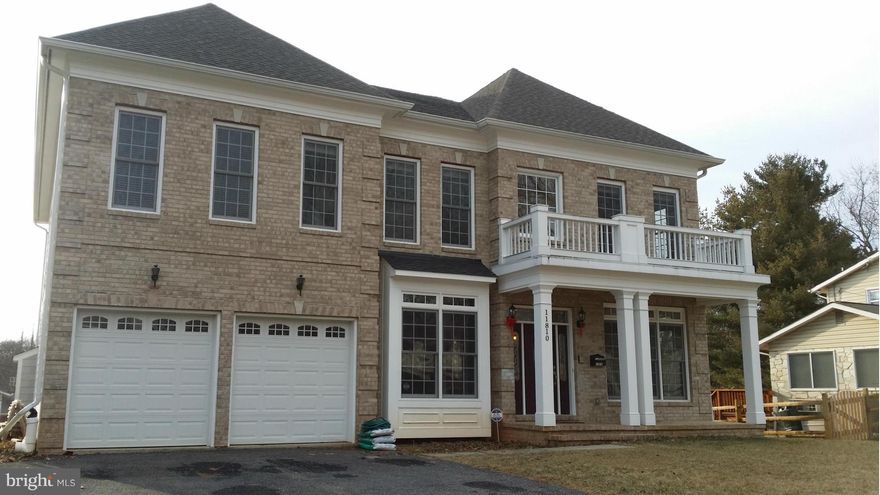 Gorgeous home displays no expense spared from top to bottom.  Open floor plan includes sunroom, morning room, open space basement with wet bar, theater room,  1 bedroom and 1 full bath, 1 den and 1 half-bath, master bedroom with sitting area, huge master bath and walk-in closets.  Brazilian cherry hardwood floors, custom made windows, are among the too many exquisite features of this home.