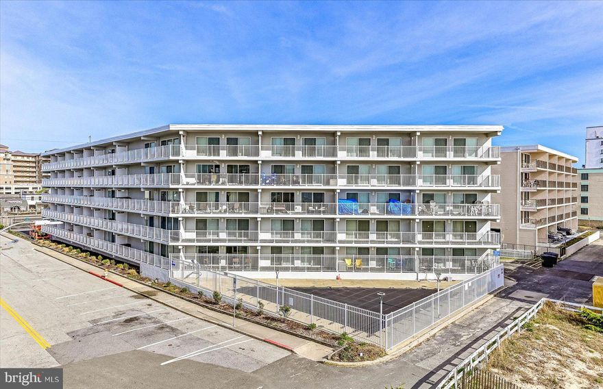 This well maintained ocean block condo is situated in close proximity to the beach!  Recent interior updates include a new vanity in the main bathroom (2023), a new toilet in the en suite powder room (2023), wood laminate flooring in the bedroom (2021), and new interior doors (2021). The building has undergone exterior enhancements from 2020 to 2023, including new paint, floor coating, balcony railings, windows, and sliding doors with screens. With a southern facing orientation, this unit offers an ocean view and a hint of a bay view from the balcony. The unit boasts a kitchen with granite counters and tile flooring and the living room features tiled floors and a stunning beach mural, creating a serene and inviting atmosphere. Building amenities for Diamond Head include an outdoor pool, elevator and 1 assigned parking space and some additional first come first serve parking.  This midtown ocean block location at 80th St. is so close to the beach, is conveniently located to many restaurants, shopping, entertainment, miniature golf, allows for easy access in and out of Ocean City via Rt 90 at 62nd St., and only a few miles from the world famous Ocean City Boardwalk! What a fabulous opportunity to own an ocean block condo in Ocean City, MD that is so close to the beach!