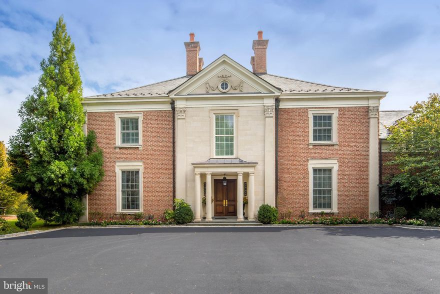 After an extended search for a classically styled turn-key existing home, the buyers came away disappointed by offerings of large older homes with lower ceilings, undersized master suites, inferior closet space and almost a complete lack of family gathering areas, or worse, poorly conceived and poorly executed new construction. The decision was made in 2000 to assemble a superior team of craftsman to build a home that was  every bit as well constructed as the stately homes of the 1920 s but with a focus on the how family life had shifted to demands of bright spaces with high ceilings, state of the art systems all without sacrificing elegant design. The team of Bissinger AIA, EB Mahoney builders, Gale landscaping and Hawkins Interiors completed the design/build in 2004 and to stunning result. The Monticello brick, beautifully balanced 4+ bedroom Georgian Mansion style sits on almost 3 acres in an established Gladwyne neighborhood, a stone s throw from Philadelphia Country Club, surrounded by exceptional gardens enjoyed from a deep wrap-around side and rear pavilions.  Custom double doors open to an expansive sunlit front to back center Foyer boasting 16-foot ceilings and the richly stained hardwood flooring which is found throughout the homes three finished levels.  Located in this generous Foyer and designed for ease of entertaining, two onyx wet and dry bars secret away behind paneled doors when the guests have returned home. Positioned on the south east side of the home are the formal Living Room and Library. Multi-piece crown molding, deep windows and extraordinary fireplaces, marble and onyx in the LR and carved Honduran mahogany in the Library, are detailed  old-school  with chevron brick interiors. A cocktail pavilion located off the handsomely paneled Library extends the entertaining while taking in breathtaking views. Gracious and impressive, the formal Dining Room is capable of hosting the most the elegant large-scale events while steps away a less formal Breakfast Room offers similar elevated finishes and is warmed by a marble and wood surround fireplace and brightened by French doors which open to the eating area of the pavilion. Centrally positioned as a link to both formal and informal spaces, the fully equipped professional grade Kitchen has custom cherry cabinetry, granite counters and backsplashes, 6 burner Wolfe stove and double ovens, subzero freezing and refrigeration and a walk-in pantry designed for storage of dry goods. Adjacent to the kitchen and enhanced by honey toned character grade wood on the 25-foot-high ceiling and ornamental trusses, is an exceptional Family Room. A walk-in fireplace flanked by crisp white display shelving, triple door exits to a stone terrace and a floor to ceiling window inviting in the surrounding lush grounds provide interest and welcome to this truly inviting space. Located off the kitchen and through a swinging service door to the Dining Room, the Butlers Pantry with teak counters provides generous storage and display for stem and dinner ware. Outfitted with a Sub Zero wine chiller, Miele dishwasher and Scottsman ice maker, this space provides connection to the family entrance of the home and beyond to the Greenhouse, currently purposed as an Art Studio, as well as  back staircase, leading to both the family bedrooms as well as staff-quarters. Ascend the grand sweeping front stairs to a wide second level foyer. The Master retreat enjoys a 16 foot volume ceiling,  separate marble baths, hers with an under window jetted tub and bidet and both connected to their own  haberdashery-styled mahogany custom closets. Three additional bedrooms each with en-suite baths and generous closets are also found on this level. The attic, fully floored  is accessed by a traditional staircase and with 10-foot ceilings this space provides excellent primary storage or expansion opportunity. The lowest level or Garden level of the home provides unparallel recreational space.