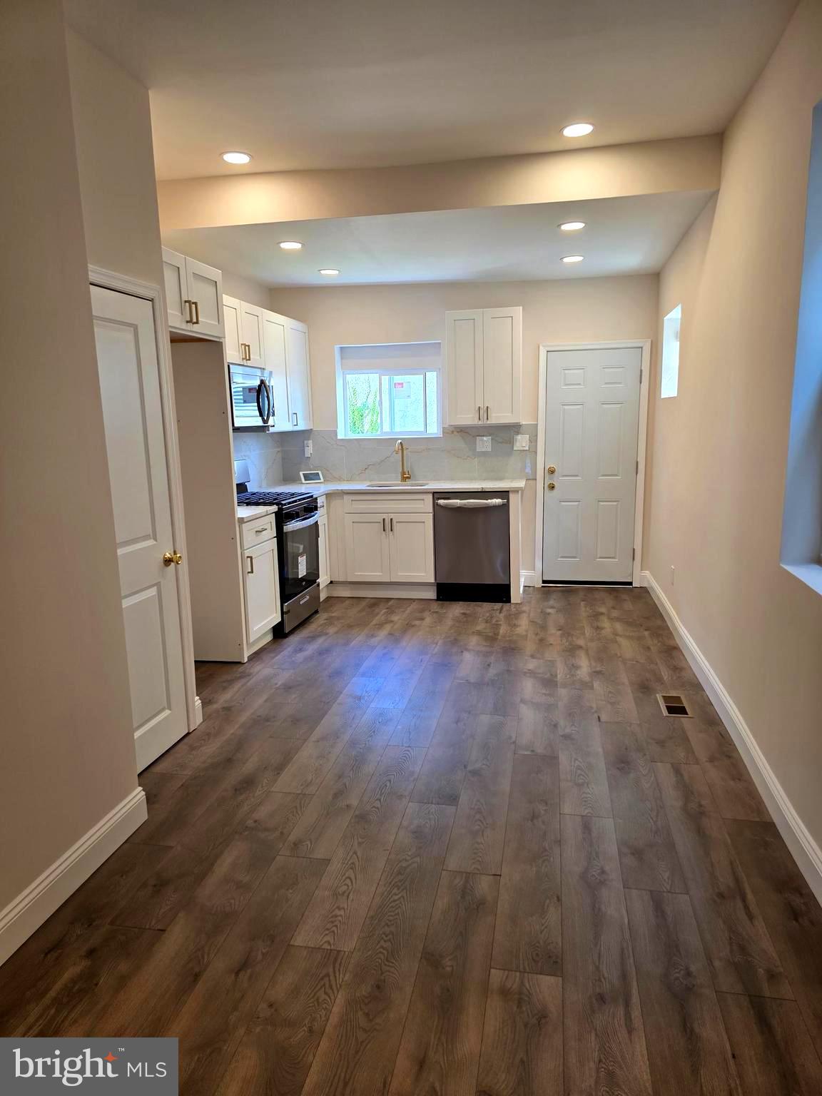 Recent price adjustment! Fully renovated home featuring 3 large bedrooms, and 3 bathrooms. Located within walking distance of public transportation. This beautiful rehab boasts a new central air system, electrical, and plumbing, new flooring throughout, doors, windows, tiles, stainless steel appliances, and much more. Ask about Sellers Assist.