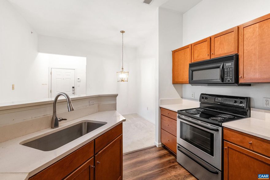 Incredible upper level 1BR at sought-after Walker Square. Largest 1BR floor plan has soaring 10' ceilings, new 2025 HVAC, updated features and fixtures. Ideal location across from the clubhouse. Walking distance to UVA Hospital, UVA Grounds and Main Street shops & restaurants. Light and bright with a southern view of mountains. Oversized BR has large walk-in-closet.  Convenient in-unit laundry. Walker Square amenities include clubhouse, gym and pool. Available immediately, no pets.