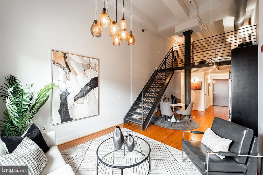 Discover this Elegant Loft-Style Condo in Vibrant Logan Circle! Redeveloped in 2013 by renowned builder P.N. Hoffman, this building was originally built in 1902 by C&P Telephone Company, serving as the telephone switchboard for the Northern quadrants of the District. Northern Exchange is truly a historic gem in Washington's lively 14th Street Corridor. Embracing its rich history, the secure lobby with video intercom features a vintage phone booth, blending architectural charm with modern living. #406 offers a unique presence with stunning Washington Monument views and soaring 15-foot ceilings. Revel in the industrial-chic design with exposed original brick, gleaming hardwood floors, top-of-the-line stainless steel appliances, and automatic window treatments. The loft area accommodates a king-sized bed and work-from-home space, complemented by an in-unit washer/dryer, a sleek bathroom with porcelanosa tile, and plenty of closet space. Enjoy the rooftop patio with grilling and lounge area, and wet bar entertaining area- perfect for hosting friends and family while taking in DC's architecture and monumental views. Additional amenities include bike storage and convenient access to DC’s vibrant dining and shopping scene, amongst favorite restaurants like Le Diplomate. Fall in love with tree-lined R Street and the walkability this location offers while living in this impressive 2-story condo today!

Investor-friendly building! Great purchase for buyers who want to make passive income on a rental property.

Pet-friendly building!