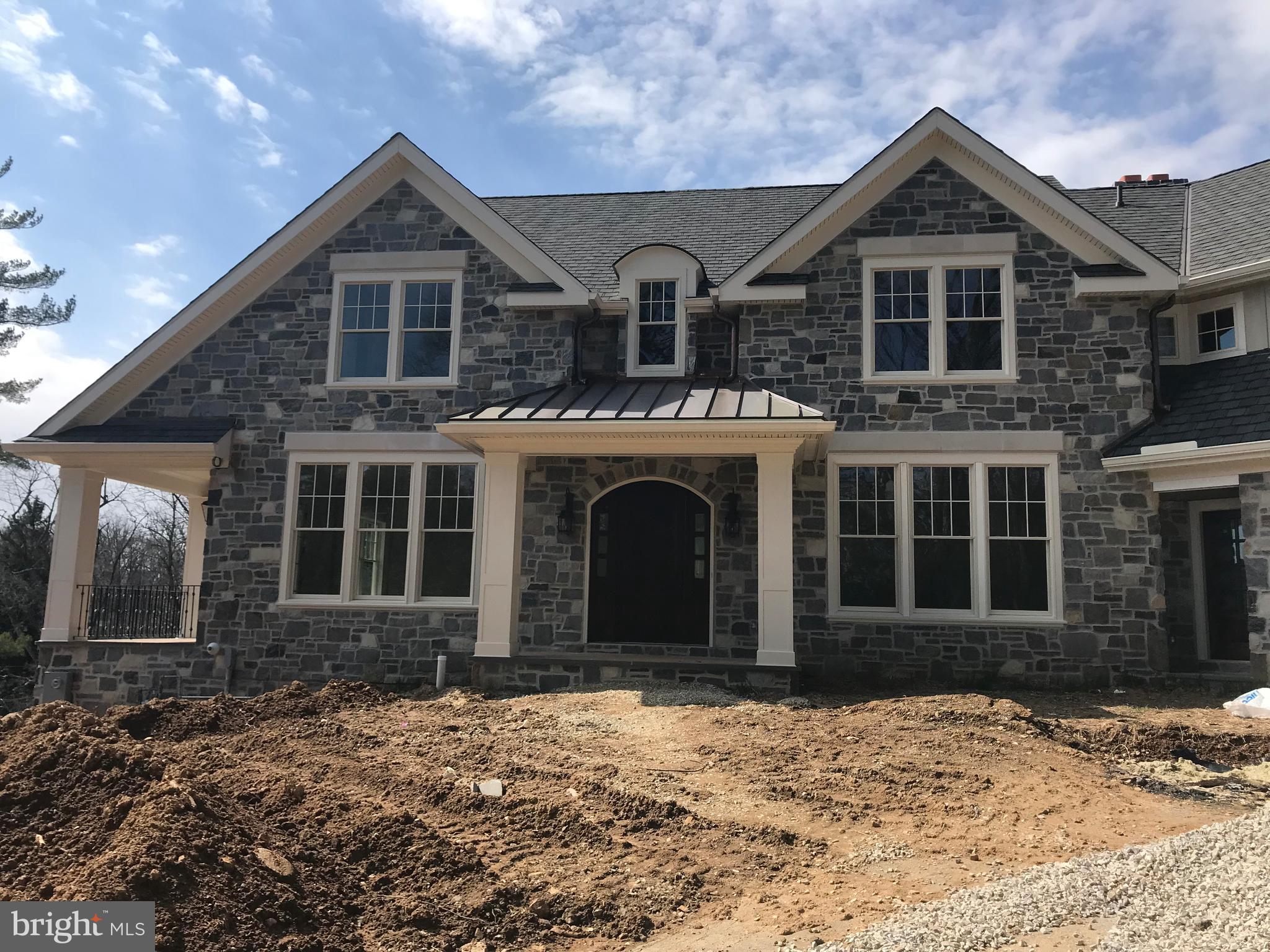 Radnor Township = New original floor plan custom home that expects a Summer 2018 completion. Entrance is nestled down a long country driveway off of Orchard Lane (private street)and adjacent to the Radnor Trail. The home is oriented to capture Southern exposure,sitting high on the hill. The 1.25 acre lot provides plenty of flat area for a pool and lawn area as per Gale Nurseries landscape design. This exciting new McIntyre Capron design/open layout concept has approx 5000 square feet on two floors. The plan includes an unfinished daylight basement, a walk up third floor, a study and interior work office. The contemporary kitchen is complete with commercial range, wood burning pizza oven and spacious island which flows to the large gathering/living/great room with pivot point doors opening to the covered veranda with large outdoor wood burning stone fireplace ideal for indoor and outdoor entertaining. The second floor contains a large master suite with gas fireplace and 4 additional bedrooms and the staircase winds open to all 4 floors. The acre plus lot gently slopes and has very few large trees thus providing for a daylight walkout basement and maximum sunlight. The location is private yet convenient to all major highways and downtown Wayne. Work with your designer to complete this rare new construction opportunity on Parkes Run. Driveway is off a orchard lane, a private lane though the house will have a Parkes Run address. Currently slated for a hardiplank and stone exterior. Time to speak with builder about additions/changes such as a Pool and separate detached single bay garage. Realtor related to builder.