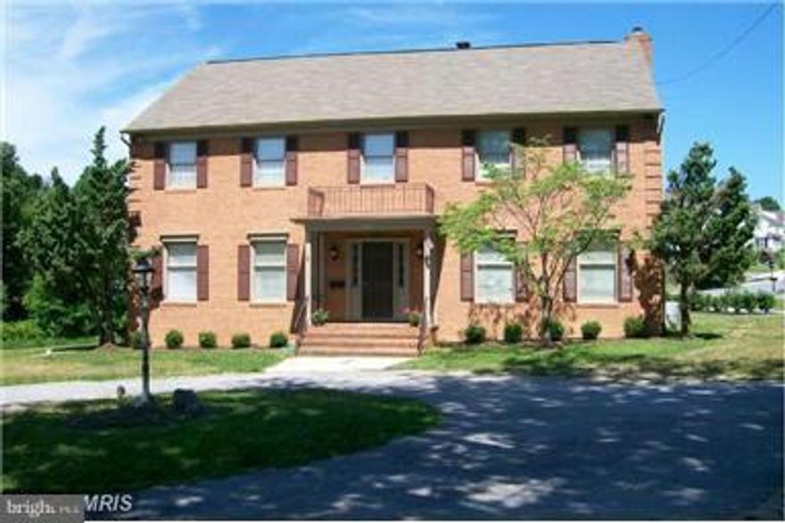 Brick colonial in the desirable Paradise Village Community. Grand Entrance with marble floors, hardwood on main & 2nd flrs. Spacious 6 Bedroom 4.5 Bath, enclosed sunroom, 50ft. brick patio, finished lower level. Kitchen includes ceramic flooring, granite counter tops, breakfast room w/ sliding doors to patio. Finished basement. New AC in 2011. Price reflects work needed on the home. Sold "AS-IS"