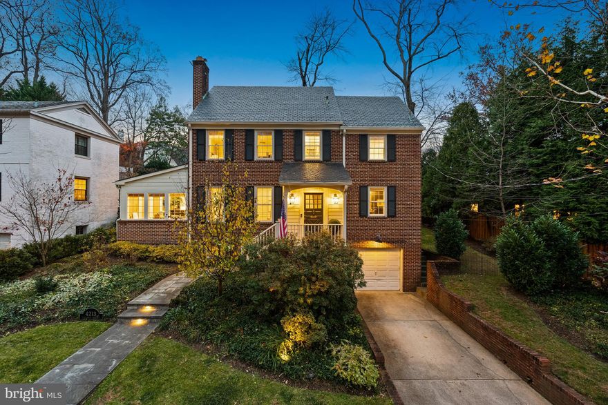 This classic brick Colonial bathed in natural light has been beautifully maintained and updated throughout and offers an ideal layout for both everyday living and effortless entertaining. Step into the welcoming foyer and discover a gracious flow from room to room. The formal living room features a fireplace and custom built-ins and opens to a bright sunroom—perfect as an office or den and has access to the side patio. The gourmet eat-in kitchen boasts a center island, stainless steel appliances, and a sunny dining area with access to both side patios. Adjacent to the kitchen is a spacious family room with the flexibility to function as a main-level bedroom suite, as there is a full bathroom on this level. 
Upstairs, you will find three generous bedrooms and two updated full baths including the primary suite. The primary suite includes access to the third-floor home office, a versatile space that can serve as a work area, studio, or quiet retreat, along with a large storage room.The finished lower level offers a comfortable recreation room, laundry area, half bath, additional storage, and direct access to the one-car garage. Outside, the low-maintenance backyard provides two separate patio areas for outdoor dining and relaxation. 
Located in the Town of Chevy Chase, this home is just blocks from restaurants, shops, schools, parks, playgrounds, and the weekend farmers market. Convenient to downtown Bethesda, Metro, and major commuter routes. As a municipality, the Town of Chevy Chase provides services including snow removal, trash and recycling, leaf collection, and public safety.