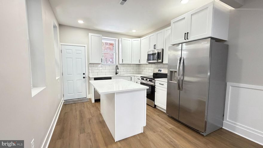 Unbelievable 3 bedroom 2 bath home in close proximity to schools, parks, and shopping! Enter through the cozy front porch to find an open-layout living and dining area with chair molding, wall frames, brand new flooring, recessed lighting, and custom trey ceiling. The lavish kitchen boasts rich cabinets, granite counter-top, stainless steel appliances and sleek back splash. The second floor offers wood floors, a master suite with its own luxurious bath, two additional bedrooms with plenty of sunlight and closet space, and a shared hall bath. Both baths feature imported tiles and brand new vanities, tub, and fixtures. The finished basement offers new carpet, additional space for entertaining or relaxing, laundry and forth bedroom .  Other key features include brand new efficient water heater, central air HVAC system, and 100amp electrical system, new plumbing system. Updated with an amazing attention to detail and the finest quality, this home is a must see! Disclosure: Listing Agent has financial interest. The property are under live video and audio surveillance. All access and showings are recorded and monitored remotely. By entering the property, you give automatic consent to be recorded and monitored with both video and audio. Footage stored off site. All video and audio recordings could be made public.