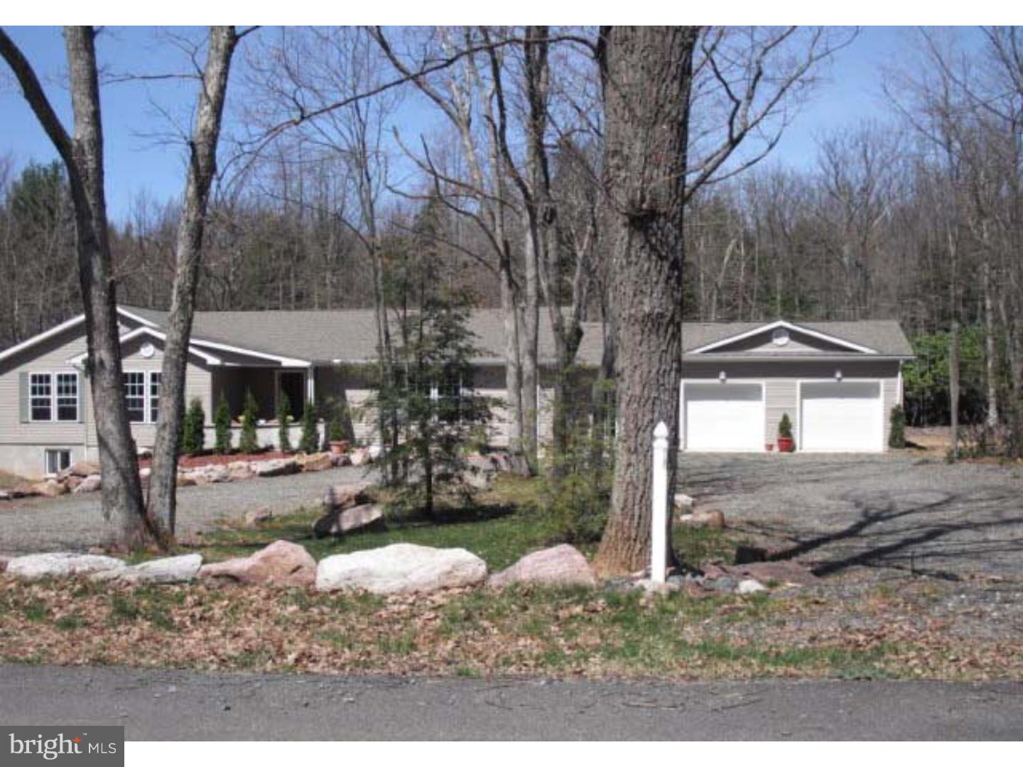 SUNRISE RIDGE-Near Lake Harmony. 3 bedroom, 4 bath, wet bar, game room area, 2 entertainment rooms! Even a wine storage room! Circular driveway with 2 car garage. Next to state game lands. School District is Jim Thorpe, twp is Penn Forest. Mailing Address Continued: Jim Thorpe