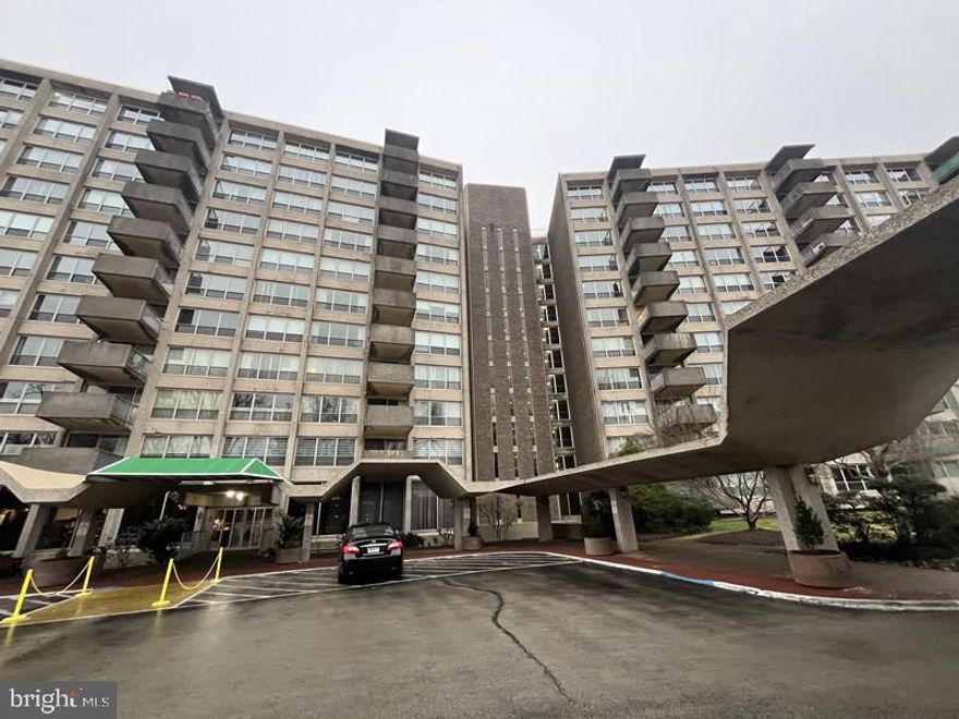 A fantastic opportunity to own a spacious residence in the Green Hill condominium community in Wynnewood, Montgomery County, Pennsylvania. Originally developed in 1962, Green Hill is a well-established, secure, gated high-rise community known for its convenience and amenities.
This unit offers approximately 1,222 square feet of finished interior living space, featuring an oversized living room, kitchen, two generously sized bedrooms, and two full bathrooms. The home includes central heat and air conditioning for year-round comfort and laundry area.
Residents enjoy excellent amenities, including a beautifully maintained lobby with doorman service, indoor and outdoor swimming pools, and a fully equipped fitness center. The community provides a secure, gated environment for added peace of mind.
Ideally located near the Main Line s premier shopping and dining destinations, with easy access to Center City Philadelphia, this property combines comfort, space, and location.