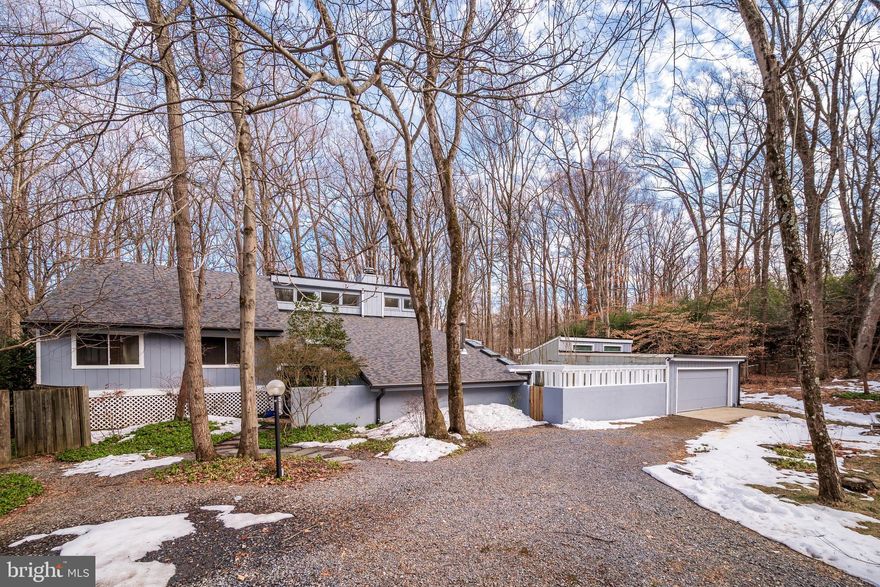 A Secluded Contemporary Masterpiece

Perfectly positioned at the end of a quiet, prestigious cul-de-sac, 11005 Fawsett Road is a contemporary sanctuary defined by light, volume, and an incomparable sense of privacy. This architectural gem sits on a gorgeous private lot of over an acre, where the hustle of the world fades into a backdrop of mature trees. From the moment you enter, gorgeous hardwood floors and soaring ceilings set a tone of modern elegance, creating an airy, ethereal atmosphere that follows you through every room. The main level is a masterclass in sophisticated design, featuring a formal living room anchored by a stately fireplace. This space transitions seamlessly into the dining room, a true showstopper where floor-to-ceiling windows and skylights create a glasshouse effect, bathing your dinner parties in natural light. This flow leads you into the breathtaking family room, which boasts its own fireplace and high ceilings. Here, many windows act as living frames, offering panoramic views of the wooded lot and the expansive backyard oasis beyond. The heart of the home is an expansive kitchen that serves as a true chef’s dream. Designed for both high-end entertaining and daily life, it features a center island, stainless steel appliances, and ample cabinets for effortless organization. The accommodations are designed with both scale and comfort in mind, led by a primary bedroom that is pure luxury. This massive private retreat features a dedicated sitting room area and a spa-like bath. Each secondary bedroom is remarkably large, ensuring that every guest or family member enjoys their own spacious sanctuary within the home. Outside, the expansive backyard oasis provides a peaceful retreat where the wooded lot offers total seclusion for relaxing or entertaining on the deck. While this property feels like a distant woodland escape, it remains exceptionally connected, located just minutes to Potomac Village for boutique shopping, fine dining, and elite schools. 11005 Fawsett Rd is more than a home; it is a lifestyle of privacy, light, and luxury.