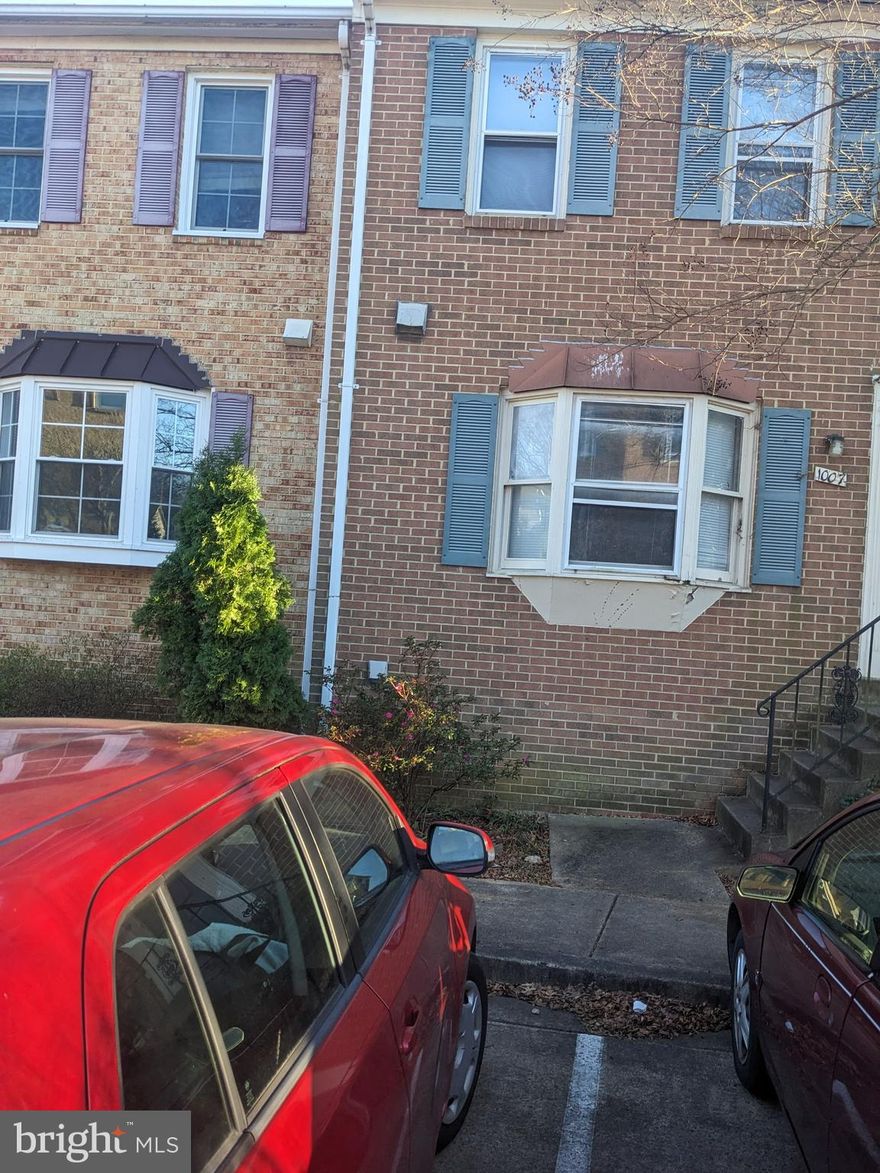 Interior townhouse in Westwind community. Hardwood floor in open living area with fireplace. Master bedroom with walk-in closet, two second level bedrooms share a hall bathroom. Finished downstairs level has rec room, fire place, utility room with washer dryer, bathroom with standing shower and a bedroom or study. Walkout to fenced patio. Backs to trees and Arlington walking and bicycle path. Everything is original from 1980 except for more recent roof and is sold as is. Currently occupied by one tenant whose lease terminates end of April.