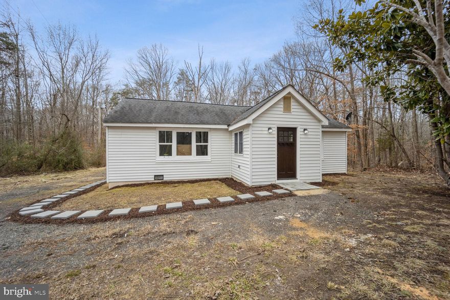 Beautifully updated bright One Level Rambler, with a modern open floor plan. Updated Kitchen with white cabinets, Quartz counters and SS Appliances. Upgraded LVP flooring throughout. Updated ceramic tiles in bathrooms. New HVAC system, water heater, water pump, windows and doors. Convenient access to DC, trails, parks and shops. Large Private tree views from all corners.