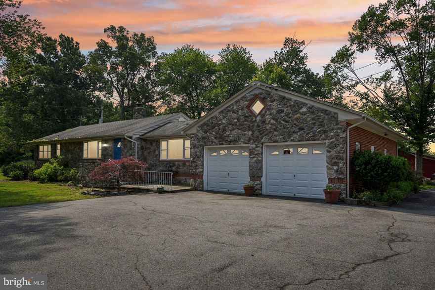 ✨ Back on the Market with Improved Price! ✨ENJOY THE VIDEO TOURS. 
Discover a Rare Opportunity in the Heart of La Plata, MD – Over 4 Acres of Charm, Comfort, and Possibility!  This beautifully improved property is ready to impress! Set on two lots totaling 4.1 acres—with potential for a lot split—this one-of-a-kind retreat offers the perfect blend of privacy, space, and versatility. From the moment you arrive, you'll be enchanted by the storybook English-style entry, framed by a classic stone wall and a winding, tree-lined driveway that sets the tone for what’s to come.

Step inside this solid all-brick and stone rancher, thoughtfully updated and lovingly maintained, offering single-level living at its best. With 3 generous bedrooms and 3 full bathrooms, including an oversized main bath perfect for a private sitting or entertainment area, this home gives you both space and comfort. Hardwood floors, a cozy working fireplace, and a sun-drenched layout make this home feel both elegant and welcoming. The upgraded kitchen features stainless steel appliances and flexible space for either casual dining or a formal setup, tailored to fit your lifestyle. 
Step outside to explore everything this property has to offer. Two sizable barns, both with electricity, open the door to countless possibilities—from agricultural ventures to hobby spaces or extra storage. A spacious workshop with electricity allows you to tackle any project, day or night. Several water well pumps are conveniently located across the property, adding practicality to its charm. Whether you're dreaming of a peaceful country retreat, a working farm, or a blend of both, this property delivers.

📍 Ideally located just minutes from downtown La Plata, shopping, and commuter routes—yet worlds away in peace and serenity.  Come and experience the beauty, privacy, and endless potential of this La Plata gem. Schedule your private tour today and imagine what’s possible!