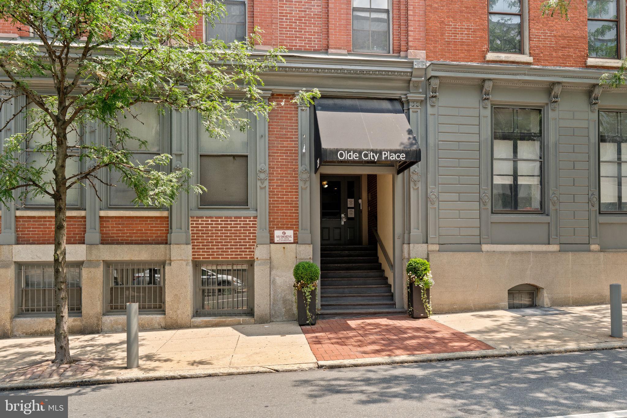 Located in the heart of Old City this spacious 1,158 sq. ft. Two Bedroom, Two Bathroom condominium residence blends historic character with modern design and comfort, The open concept Living and Dining area features soaring 10' ceilings, hardwood floors, a wood burning fireplace, exposed brick and wood beams, creating a warm inviting space with architectural charm.. The sleek white Kitchen is complete with an island, perfect for casual dining or use as a work station.The desirable split floor plan offers privacy and flexibility with each bedroom and bathroom on opposite sides of the home. The primary suite includes a generous bedroom, en-suite bath, and walk-in closet. Recent updates elevate the condo further, including a tankless water heater , a new HVAC system, and freshly painted walls that bring a modern touch to the space. For added convenience a washer and dryer are conveniently located inside the unit. You are steps away from cafes, acclaimed restaurants, art galleries (including the popular First Fridays), the farmers market, boutique shopping, historic landmarks, and easy access to public transportation. A rare opportunity to own a character-rich home in one of Philadelphia's most vibrant and walkable neighborhoods.