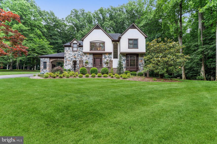 Welcome to 9715 Meadowmere Dr, Vienna, Va, located on a lush and inviting street with consistent, custom, estate homes.  Custom construction,  impeccably design with refined finishes on .89 acres at the end of a cul-de-sac backing to parkland, near Meadowlark Botanical Gardens, Wolf Trap National Park for The Performing Arts, Dulles Toll Road, 495, Tysons Corner, and multiple commuting options to DC or Amazon HQ2!  This spectacular French Country style home features 5 bedrooms plus a den on three finished levels boasting over 6800 finished square feet!  The home has 4 gas fireplaces and a generator.  

The main floor provides a brand-new marble foyer, updated kitchen with Thermador & Sub-Zero appliances, quartz counter tops, abundant storage, a breakfast room, spacious family room, screened in porch, formal living and dining rooms, a library, and two impeccably decorated half baths. The functional floor plan is ideal for everyday living and entertaining.  

The upper-level features four spacious bedrooms and three baths.  The primary bedroom has a private terrace overlooking the parkland behind the home, as well as two spacious custom closets, outfitted with refined fixtures and dressing area features.  The primary spa-like bathroom boasts a steam shower with granite counters, customer cabinetry, a jetted tub and a water closet. 

The finished, sunny, walk-up lower-level boasts a built-in wet bar with beverage center, ice maker and dishwasher with granite counters, a fireplace, billiards area, bedroom, full bath and den.  The lower level provides a spacious cedar closet, wine storage room, den that could be used as an office or 6th sleeping space, and a spacious storage room.  

Beautifully landscaped, with room for a pool, offering year-round beauty and nearby convenience to multiple shopping, dining, country club, and the W&OD trail system. The spacious lot provides plenty of room for a pool, fence and multiple outdoor living options.  Less than 3 miles from Westwood  Country Club, offering a premier golf, tennis, swimming and dining membership. 

Zoned for Fairfax County Public Schools, with multiple private school options nearby