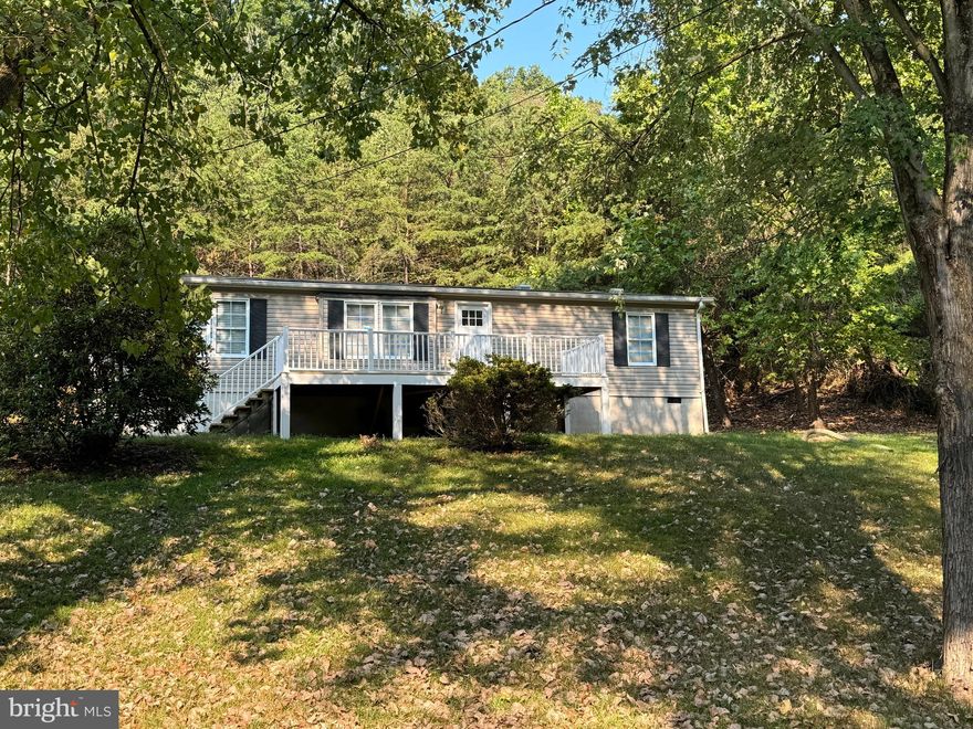 (Remodel with be completed)   Mix it up to make this newly renovated home fit your needs.  Just a stroll from US Rt 50 this  location gives you easy access but also the feel  of country. The Home consist of 2 bedrooms and 2 baths along with a den/family room that could also be converted to  the 3rd bedroom or a spacious dining room.  New decks, flooring, paint and so much more.  Put this one on your must see list and close before the summer ends.