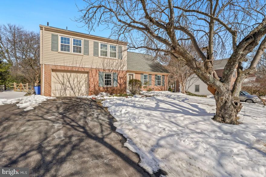 Nestled in the prestigious Whetstone community of Montgomery Village, this exquisite Colonial Split-Level home offers a harmonious blend of elegance, space and comfort. This beautifully designed living space offers four spacious bedrooms and three luxurious bathrooms, ensuring ample room for relaxation and entertainment. Step inside to discover hardwood floors throughout the main living areas while the formal dining room sets the stage for memorable gatherings, enhanced by recessed lighting that creates an inviting ambiance. A beautifully renovated kitchen equipped with new high-end stainless steel appliances, including a built-in microwave and refrigerator then spills into the first Family Room where you can find a cozy fireplace. Each bedroom is generously sized, with the master suite featuring a walk-in closet and fully renovated ensuite bathroom. In the basement you can find the second Family Room featuring nice waterproof vinyl floors and the large utility room. The attached garage provides convenient access and ample parking, while the asphalt driveway enhances the home's curb appeal.  This property is situated on a serene cul-de-sac, and features a nicely sized fenced backyard. Enjoy the Montgomery Village Community's exclusive amenities, including 7  outdoor pool, tennis courts, playgrounds, dog parks and many other amenities perfect for active lifestyles and leisurely weekends. Don't miss the opportunity to make this stunning home your own and embrace the exclusive lifestyle it offers.