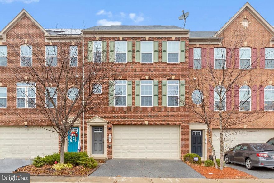 Welcome to The Preserve at Piscataway. This brick-front, three-level townhome offers a two-car garage, a walkout lower level, and outdoor living on both a deck and a balcony set against a trees-at-the-rear backdrop for added privacy. Inside, 9’+ ceilings and hardwood floors on the main level create an open, natural flow for everyday living and easy entertaining. Upstairs, three comfortable bedrooms anchor the private level with two full baths. The finished lower level adds flexible rec/media/work-from-home space, plus a convenient half bath and direct garage access.

Community perks elevate the lifestyle: clubhouse with fitness center & ballroom, 25-meter pool + tot pool, tennis & basketball courts, community center, jog/walk paths, village greens & tot lots, and a 2.2-mile hiker/biker trail that winds through preserved open space. Low-maintenance living with double outdoor spaces, versatile lower-level flex, and amenities that make weekends easy— chedule your showing today.