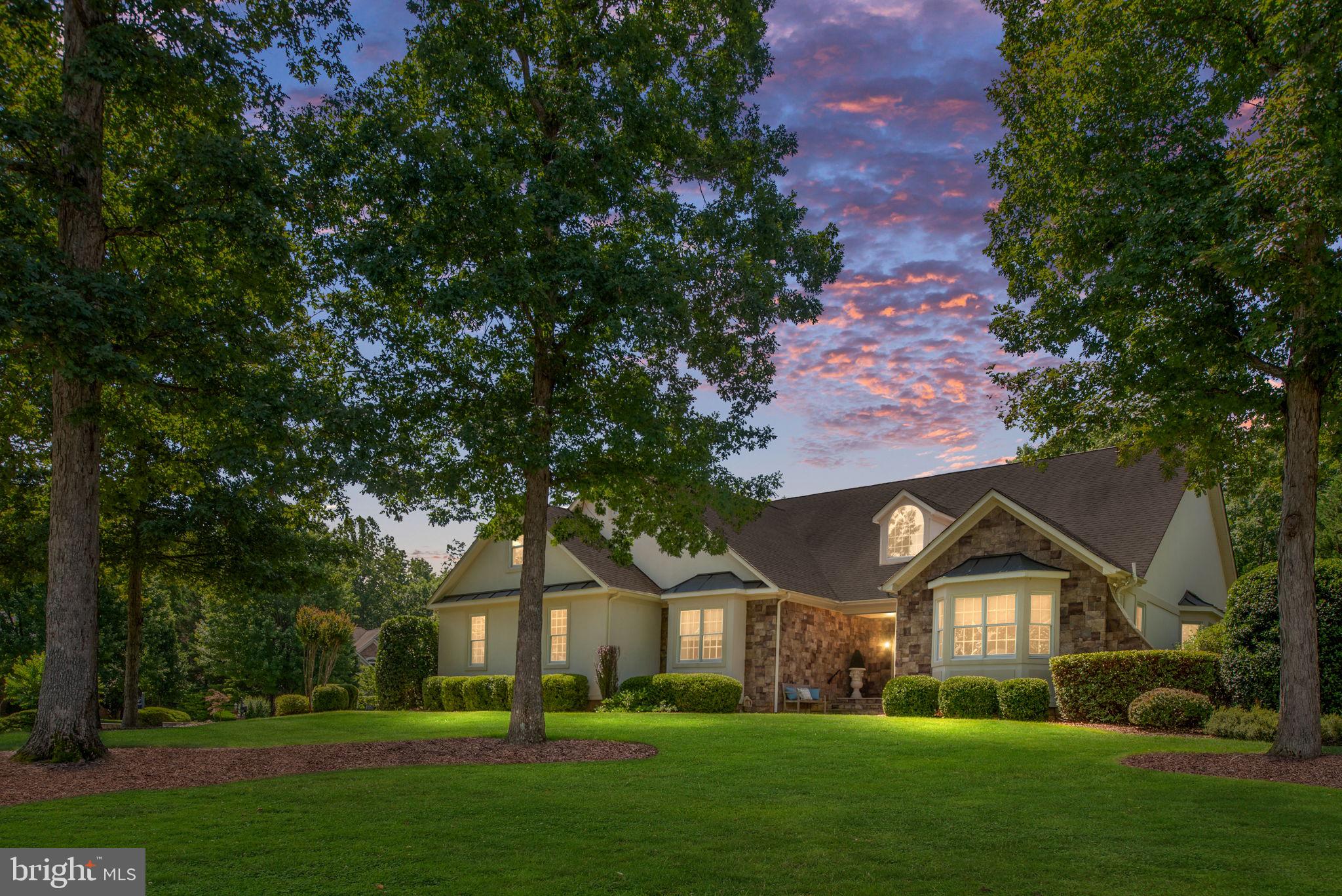 COMING SOON!! On Market Sunday 7/20! If you have been waiting for THE Custom Dream Home in sought after Fawn Lake...Welcome Home to 11208 Knolls End! This Gorgeous, Sagun-Built home abounds with Custom Features that are STUNNING at every turn! Welcome your guests through your Mahogany Front Door and Entertain in your Newly Updated Gourmet Kitchen featuring Wolf SubZero Appliances. Dine and Relax beneath the Exposed Beamed Cathedral Ceiling and beside the 3-Sided Fireplace. The double set of French Doors lead to your Covered Slate Porch, Expansive Patio with Hot Tub, Extensive Hardscape and an Outdoor Wood Burning Fireplace. The Primary Bedroom also features a Cathedral Ceiling with Exposed Beams, Updated EnSuite Bath and multiple Walk-in Closets. Three additional Main Level, Spacious Bedrooms feature Hardwood Flooring, Walk-In Closets & Custom Window Treatments. Additional Main Level Baths feature Heated Tile Floors. The Upper Level Loft and Full Bath is the perfect space for an Office, Playroom or Additional Bedroom. The Lower Level Features a Spacious Guest Suite, Recreation Room, Gym, Sauna, Wine Tasting Room & Endless Full Bar equipped with everything you need to entertain. This Home is Absolute Perfection! Fawn Lake Features Numerous Amenities including a 288 Acre Lake, Beach, Marina, Country Club, Swimming Pool, Tennis & Basketball Courts, Parks, Baseball Field, Walking Trails, Fitness Center and More!