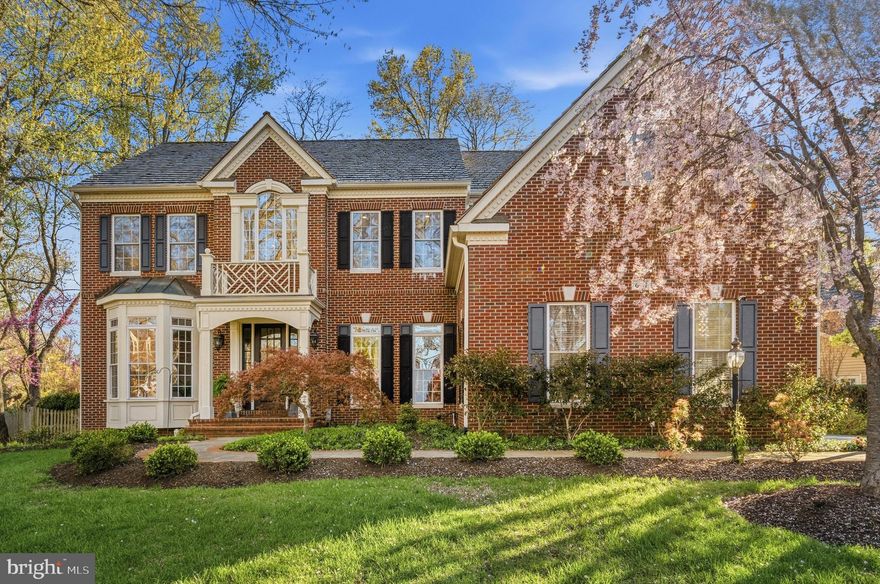 Stunning Premier Home in Sought-After Woodlea Manor Experience refined living in this exceptional home built during Winchester Homes’ “Your Home, Your Way” era—offering desirable semi-custom features and elevated design throughout. From the moment you enter, you’ll notice the difference, with 10-foot ceilings on the main level, 9-foot ceilings upstairs and in the basement, custom maple cabinetry, and hardwood flooring across both the main and upper levels. A classic center foyer welcomes you, flanked by elegant formal living and dining rooms. Tucked quietly at the rear, the private office/library features French doors, floor-to-ceiling built-ins, and a bay window overlooking serene wooded views—perfect for working or unwinding. At the heart of the home, a dramatic two-story family room impresses with a cozy wood-burning fireplace and abundant natural light. The adjacent gourmet kitchen is designed for both everyday living and entertaining, featuring a built-in Kitchen Aid refrigerator, cook-top, double ovens, granite countertops, upgraded maple cabinetry, and a spacious center island. A generously sized laundry room and convenient rear staircase add everyday functionality. The sunroom, just off the kitchen and family room, offers a bright and inviting space ideal for relaxing or hosting guests. Step outside to a beautiful stone patio and a lush, fully fenced backyard—perfect for outdoor living. Upstairs, a gracious overlook adds architectural charm. The upper level includes two spacious bedrooms connected by a buddy bath, a third bedroom with its own en-suite bath, and a luxurious primary suite. This private retreat features a sitting area, vaulted ceilings, and a spa-like bath complete with a frameless walk-in shower, soaking tub, double vanity, private water closet, and an expansive walk-in closet. 
Recent updates include:  attractive 3/4 inch shake shingle roof (10-2023),  new carpet in basement (2026),  freshly painted interior (2026), driveway resealed (FALL 2025), Main level AC replaced 2008, Upper level AC replaced 2010 (2 out of 3 zones), water heater (2018), wall ovens (2022)
Located just minutes from Leesburg, you’ll enjoy easy access to charming shops, art galleries, and top-rated dining. This is the one you’ve been waiting for—schedule your tour today.